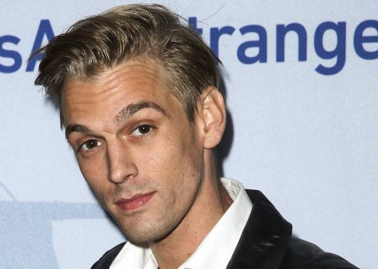 Singer Aaron Carter arrives at a premiere of "Saints & Strangers" in Beverly Hills, Calif., Nov. 9, 2015. Carter, the singer-rapper who began performing as a child, was found dead Saturday at his home in Southern California. He was 34. 