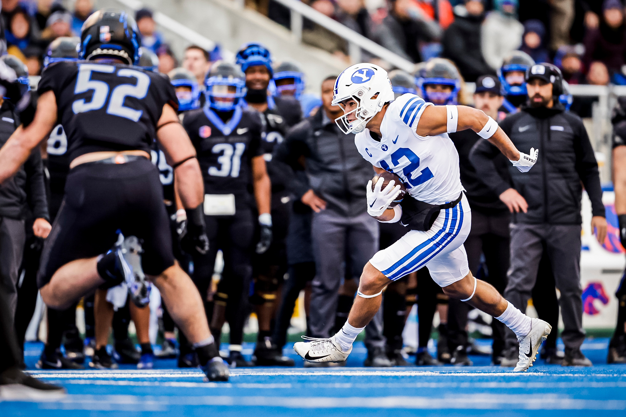 BYU wide receiver Puka Nacua (12) runs for more yardage during the Cougars' 31-28 win over Boise State, Saturday, Nov. 5, 2022 in Boise, Idaho.