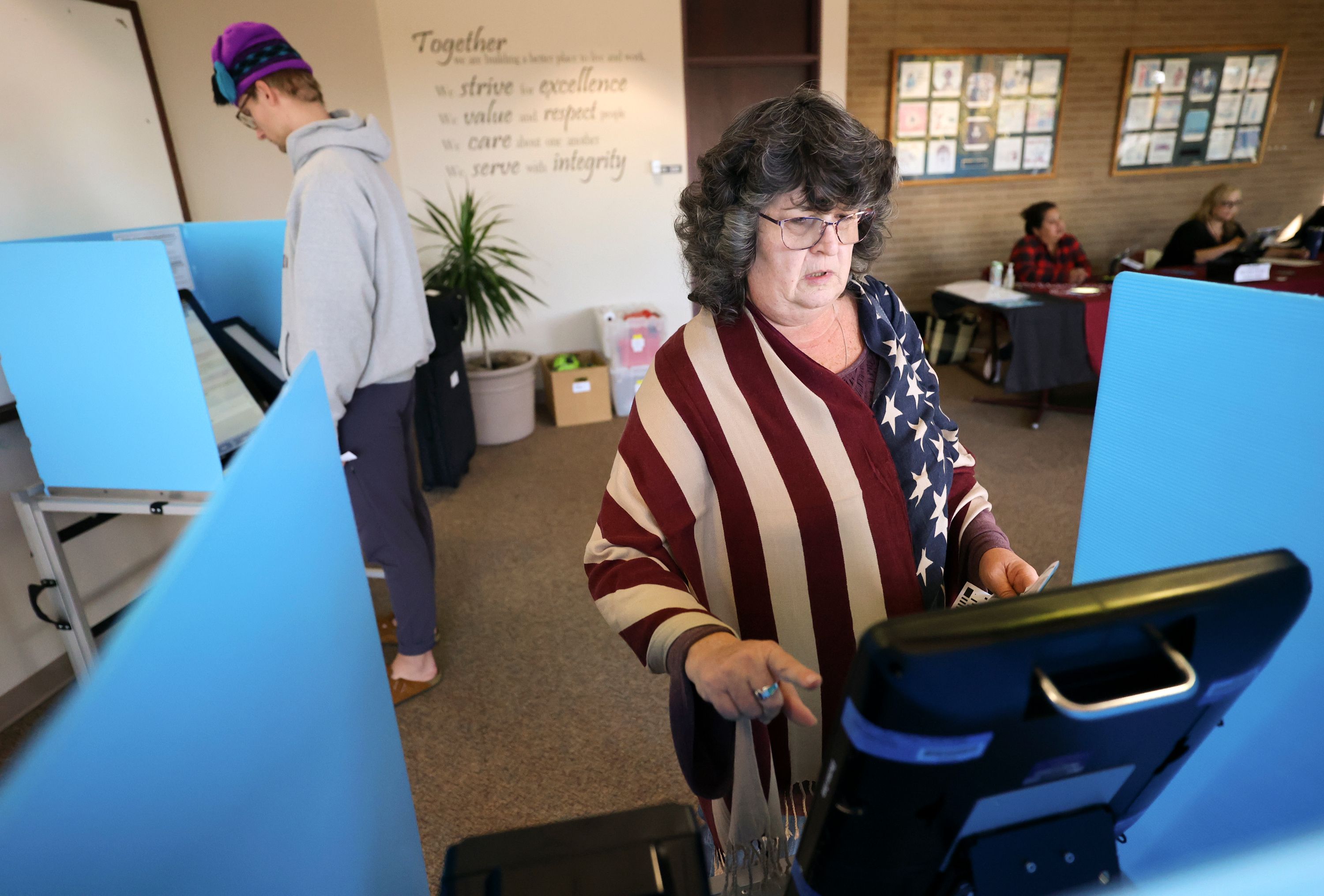 Lorrie Callaway votes early at the Salt Lake County Government Center in Salt Lake City on Thursday.
