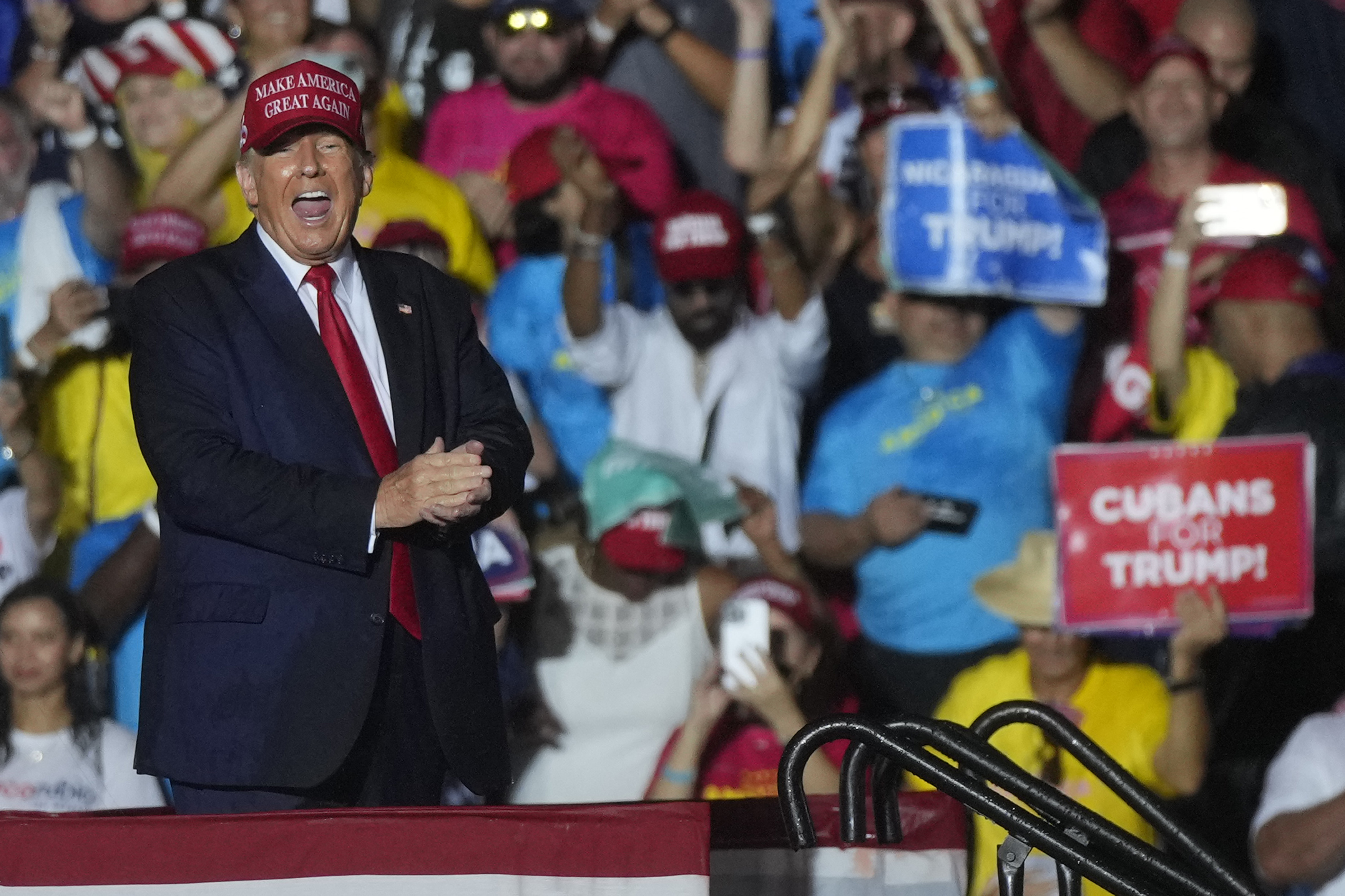 Former President Donald Trump reacts to the crowd after he finished speaking at a campaign rally in support of the campaign of Sen. Marco Rubio, R-Fla., at the Miami-Dade County Fair and Exposition on Sunday in Miami.