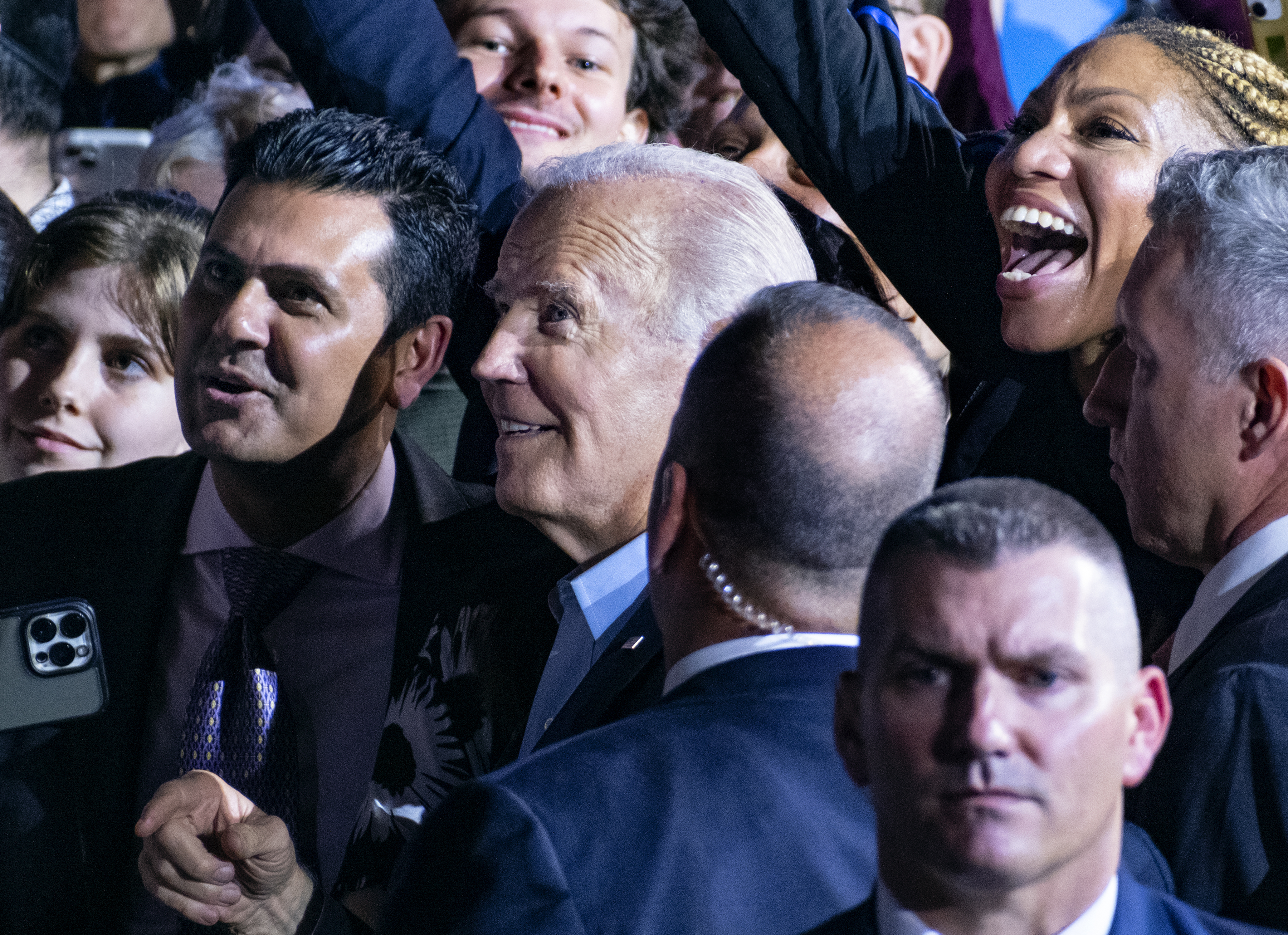 President Joe Biden poses for photos at the end of a campaign event with New York Gov. Kathy Hochul at Sarah Lawrence College in Yonkers, N.Y., Sunday.