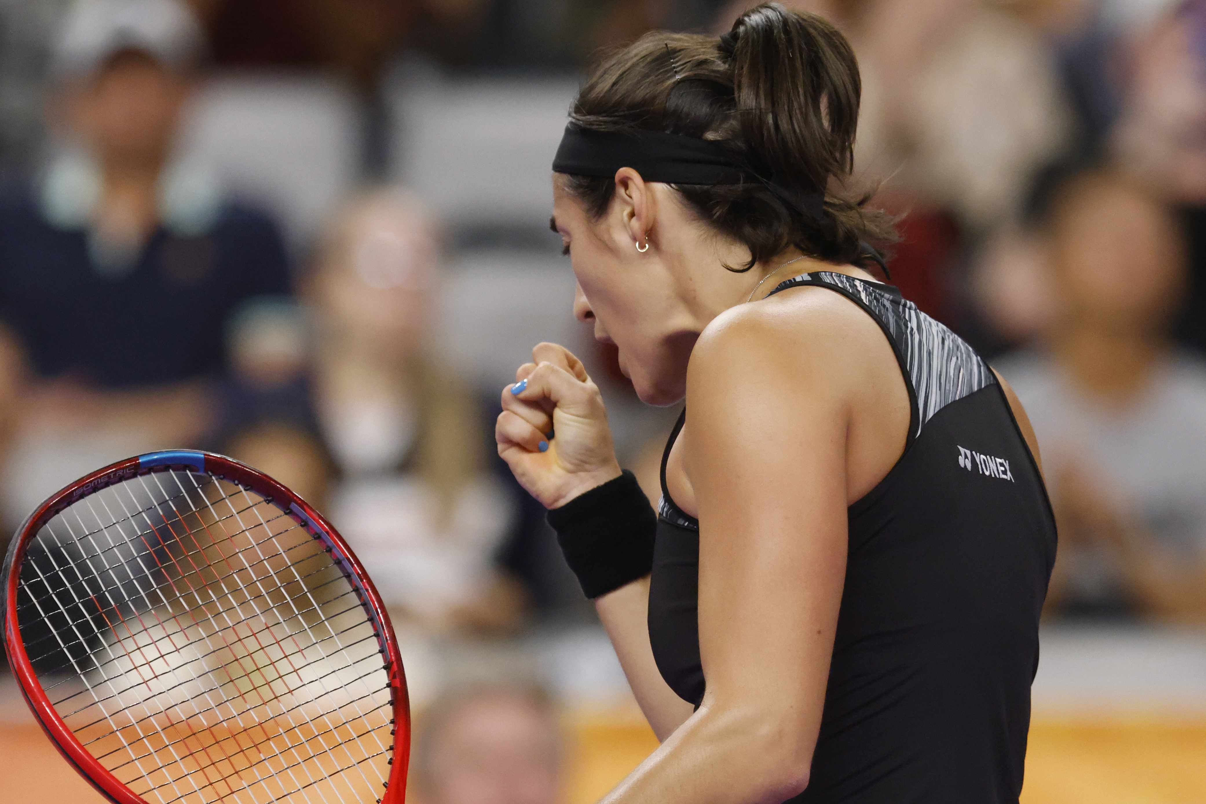 Caroline Garcia, of France, pumps her fist during her match against Aryna Sabalenka, of Belarus, in the singles final of the WTA Finals tennis tournament in Fort Worth, Texas, Monday, Nov. 7, 2022.