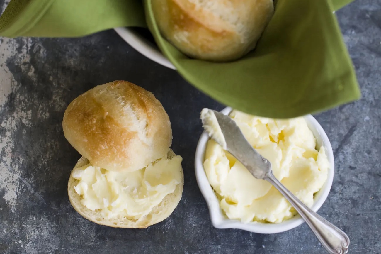 This Oct. 21, 2013, photo shows store-bought rolls with homemade butter in Concord, N.H.
