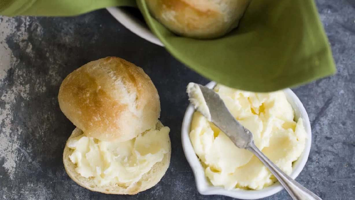 This Oct. 21, 2013, photo shows store-bought rolls with homemade butter in Concord, N.H.
