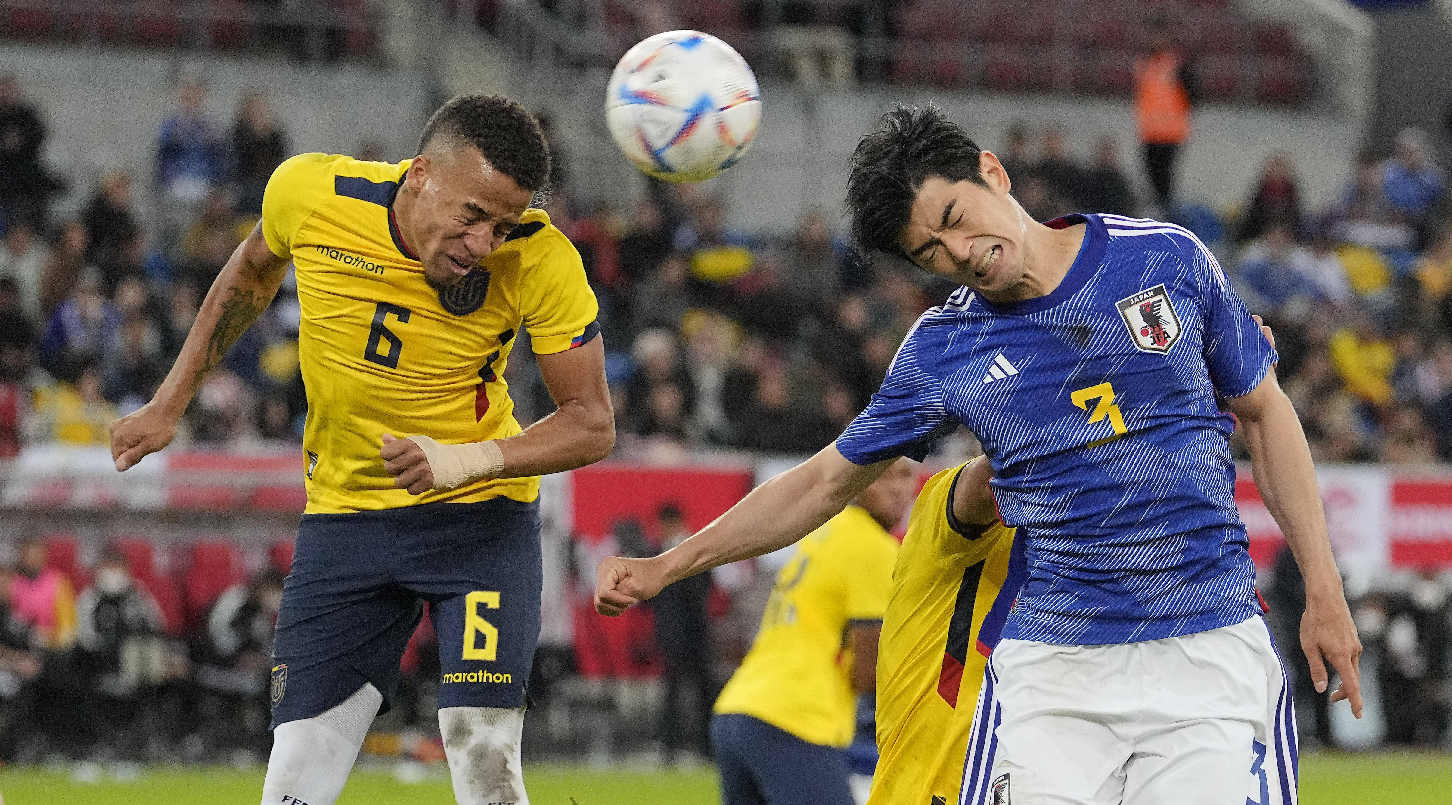 FILE - Ecuador's Byron Castillo, left, and Japan's Shogo Taniguchi challenge for the ball during the international friendly soccer match between Japan and Ecuador as part of the Kirin Challenge Cup in Duesseldorf, Germany, Tuesday, Sept. 27, 2022. 
