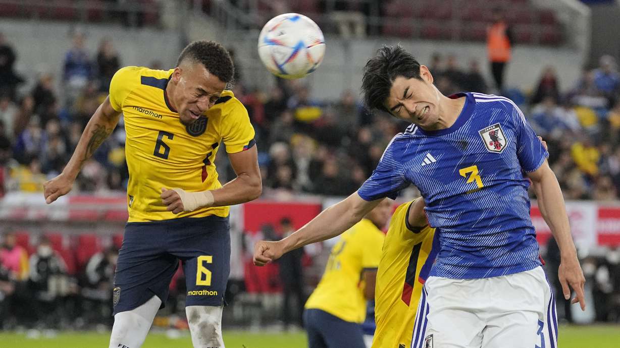 FILE - Ecuador's Byron Castillo, left, and Japan's Shogo Taniguchi challenge for the ball during the international friendly soccer match between Japan and Ecuador as part of the Kirin Challenge Cup in Duesseldorf, Germany, Tuesday, Sept. 27, 2022.