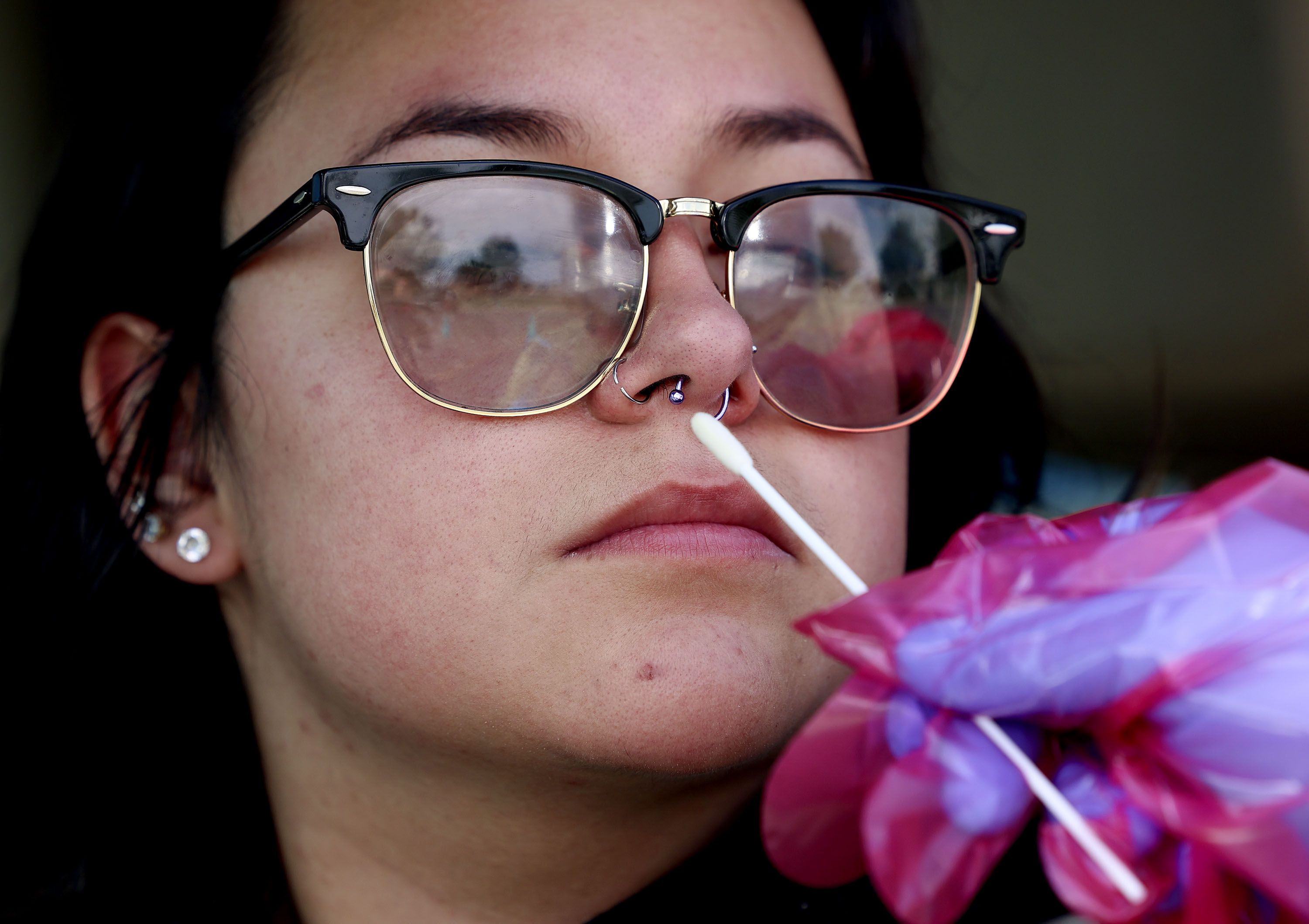 Mia Estrada receives a COVID-19 test at a Nomi Health test site at Centennial Park in West Valley City on Aug. 5. Nearly 30% of Utah's COVID-19 cases are likely being caused by what the state's chief scientist called a "nasty" pair of fast-spreading and treatment-resistant descendants of an omicron subvariant that's dominated in the United Staes since mid-year.