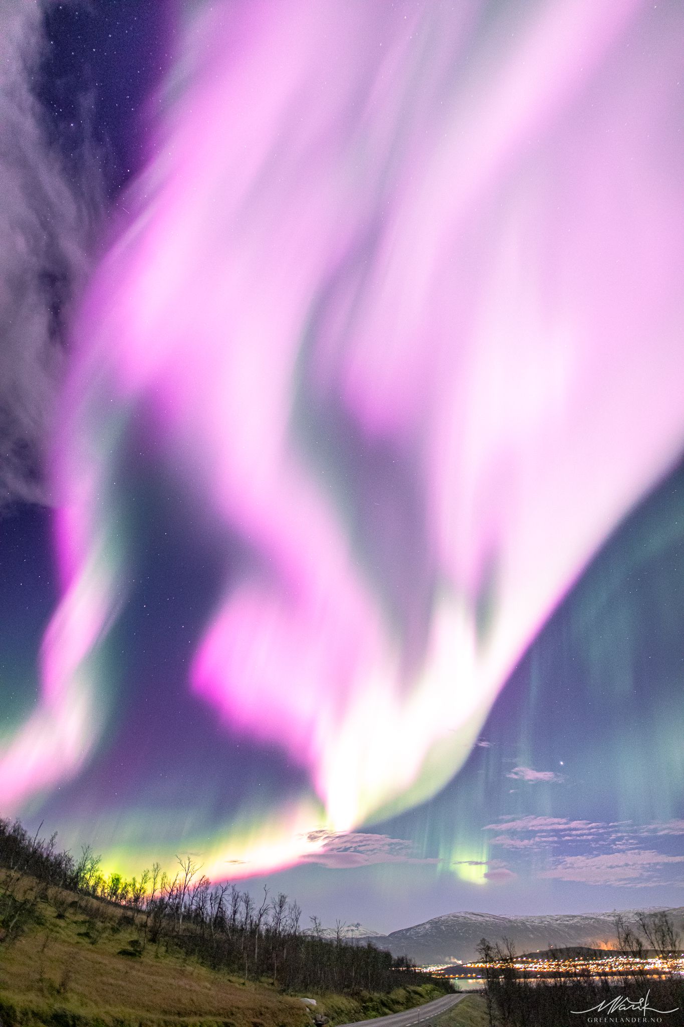 An extremely rare pink auroras is pictured on Nov. 3 by Norway adventure company Greenlander Tromso.