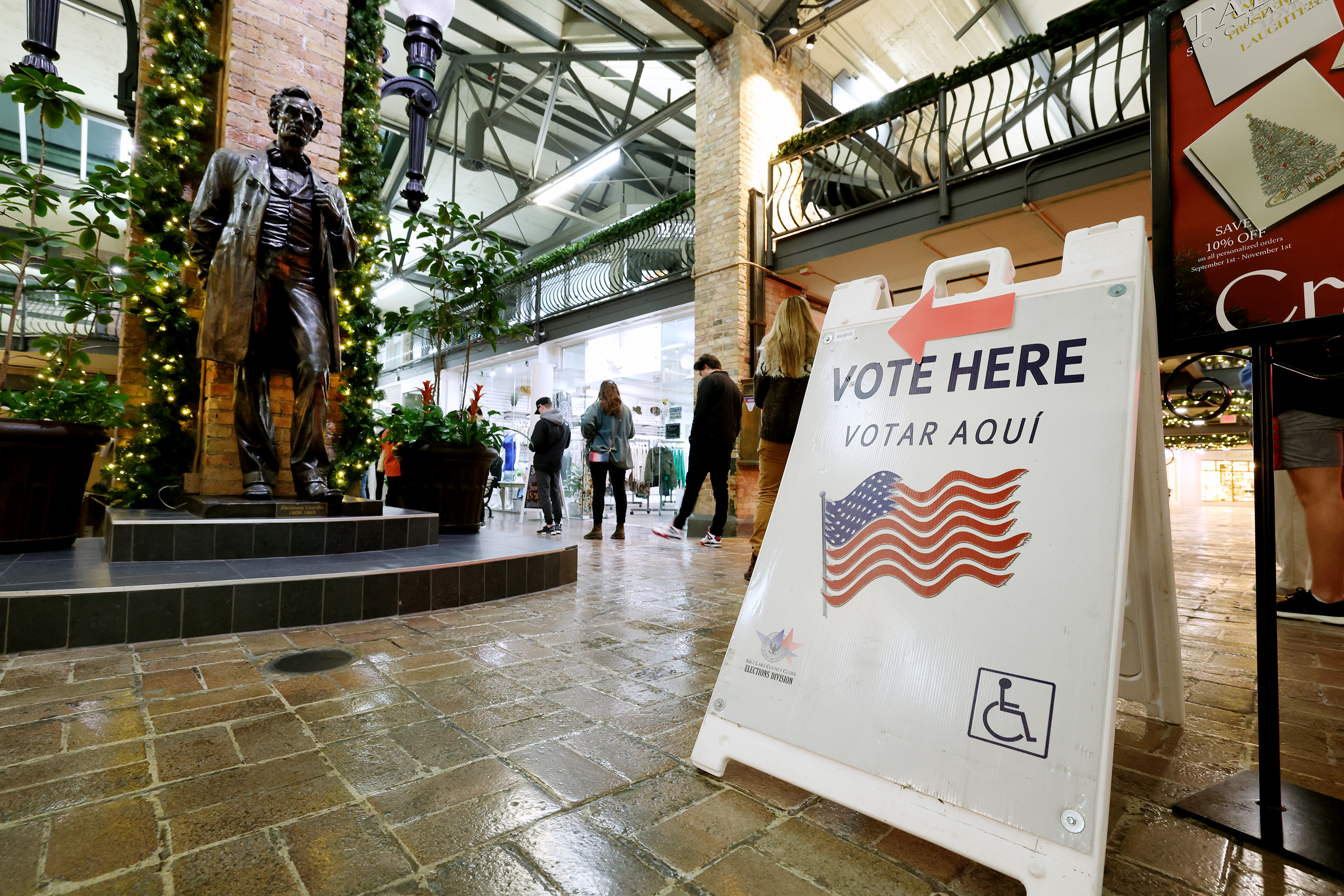 Voters line up at Trolley Square in Salt Lake on Tuesday.