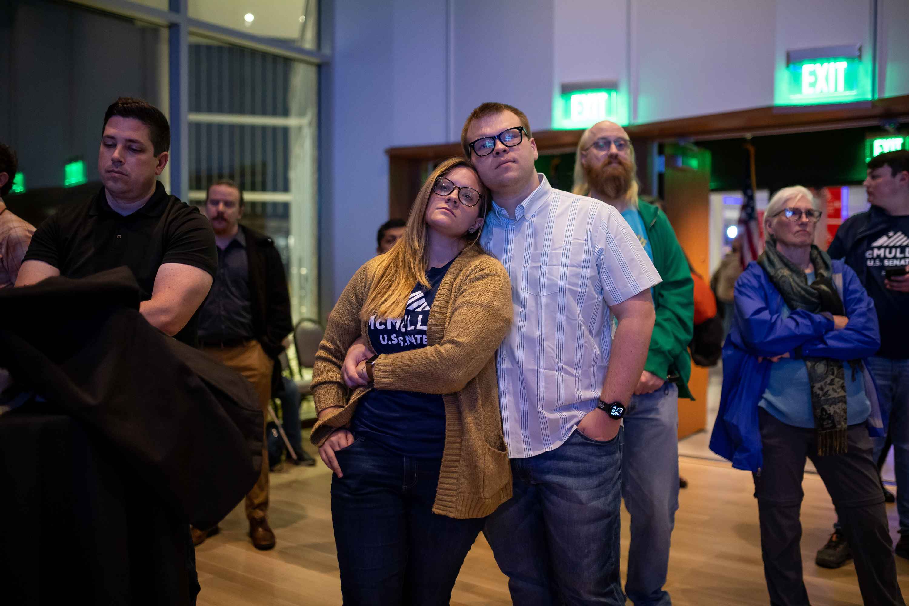 Lisa Turley Smith and Clint Smith, of Riverton, watch results come in at an election night party for independent senate candidate Evan McMullin at the Mid-Valley Performing Arts Center in Taylorsville on Tuesday. McMullin is running against incumbent Republican Sen. Mike Lee.