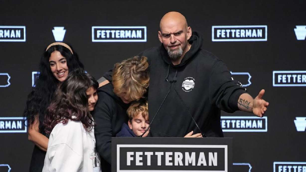 Pennsylvania Lt. Gov. John Fetterman, Democratic candidate for U.S. Senate from Pennsylvania, right, is joined by his family after addressing supporters at an election night party in Pittsburgh, Wednesday.