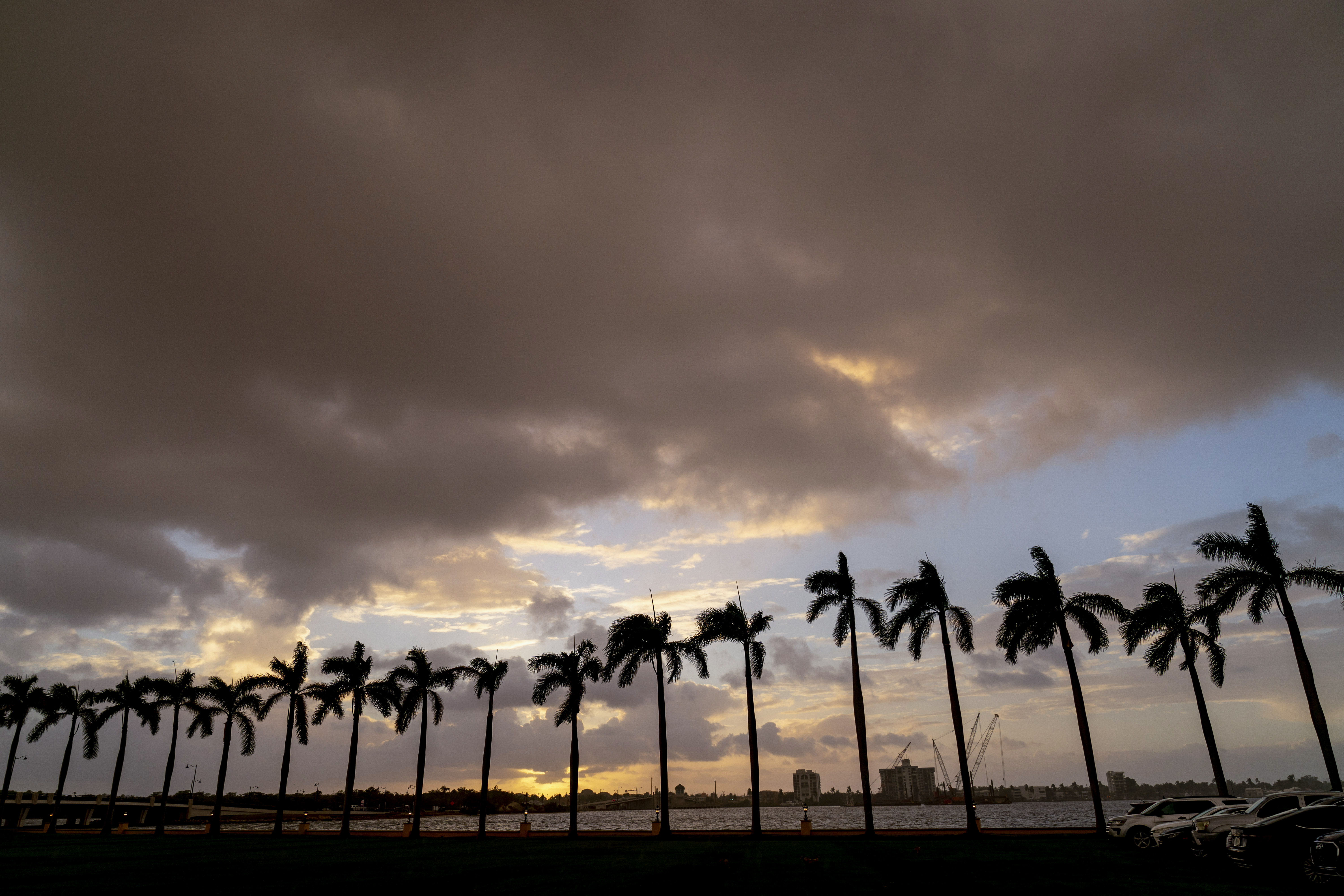 The view of the intracoastal waterway from Mar-a-lago, former President Donald Trump's club in Palm Beach, Fla., Tuesday. Tropical Storm Nicole is forcing people from their homes in the Bahamas and it threatens to grow into a rare November hurricane in Florida on Wednesday. It already has shut down airports and prompted an evacuation order that includes Trump's Mar-a-Lago club.