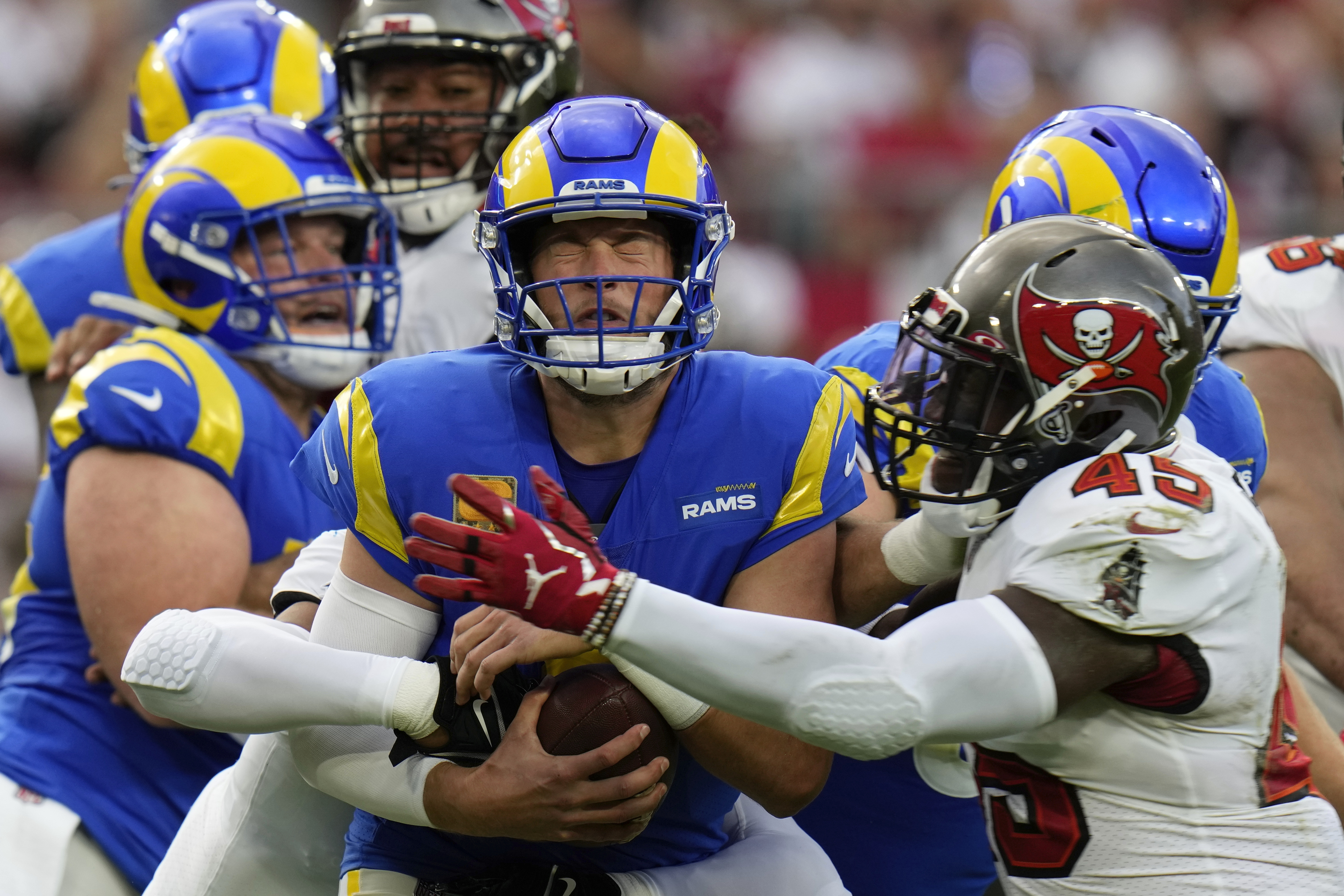 Los Angeles Rams quarterback Matthew Stafford (9) is sacked by Tampa Bay Buccaneers linebacker Devin White (45) during the first half of an NFL football game between the Los Angeles Rams and Tampa Bay Buccaneers, Sunday, Nov. 6, 2022, in Tampa, Fla. 
