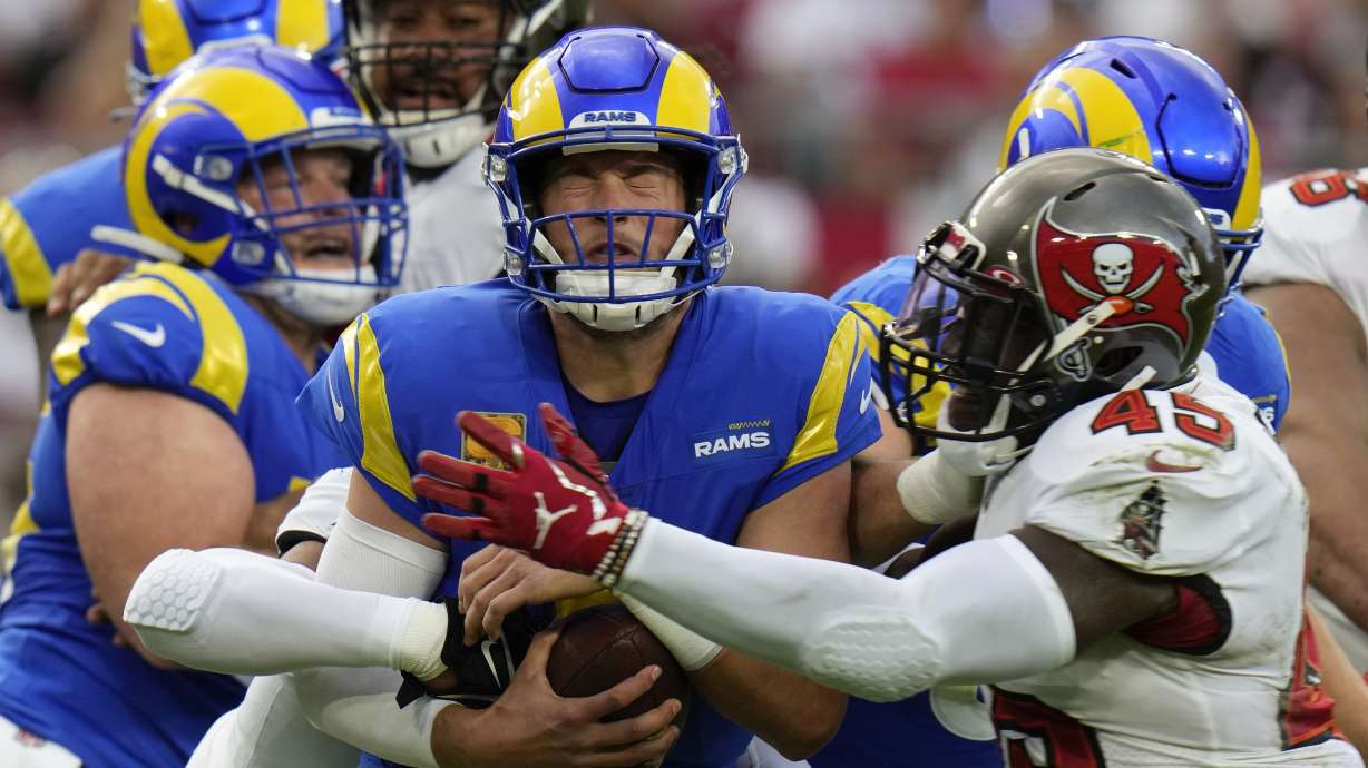 Los Angeles Rams quarterback Matthew Stafford (9) is sacked by Tampa Bay Buccaneers linebacker Devin White (45) during the first half of an NFL football game between the Los Angeles Rams and Tampa Bay Buccaneers, Sunday, Nov. 6, 2022, in Tampa, Fla.