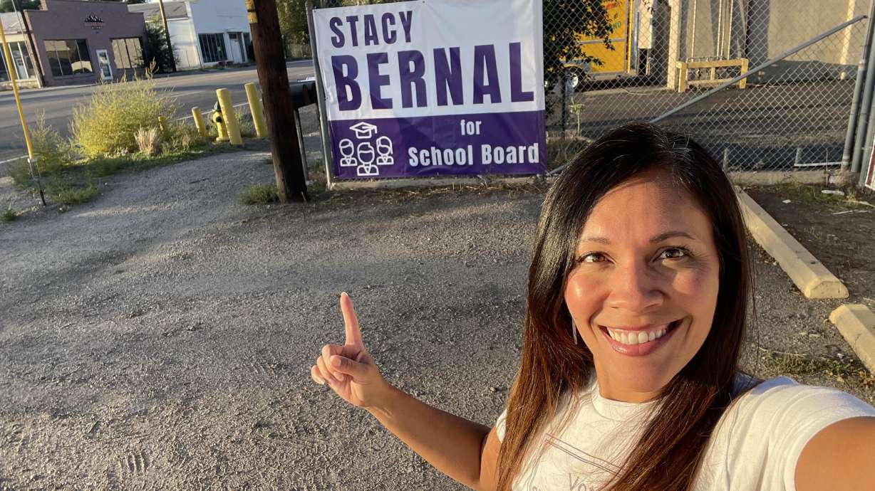 Stacy Bernal poses for a photo in front of a campaign banner on Wall Avenue in Ogden on Sept. 28. Bernal won the District 2 seat on the Ogden School Board, beating two-term incumbent Doug Barker with 65% of the vote, according to results as of Wednesday.