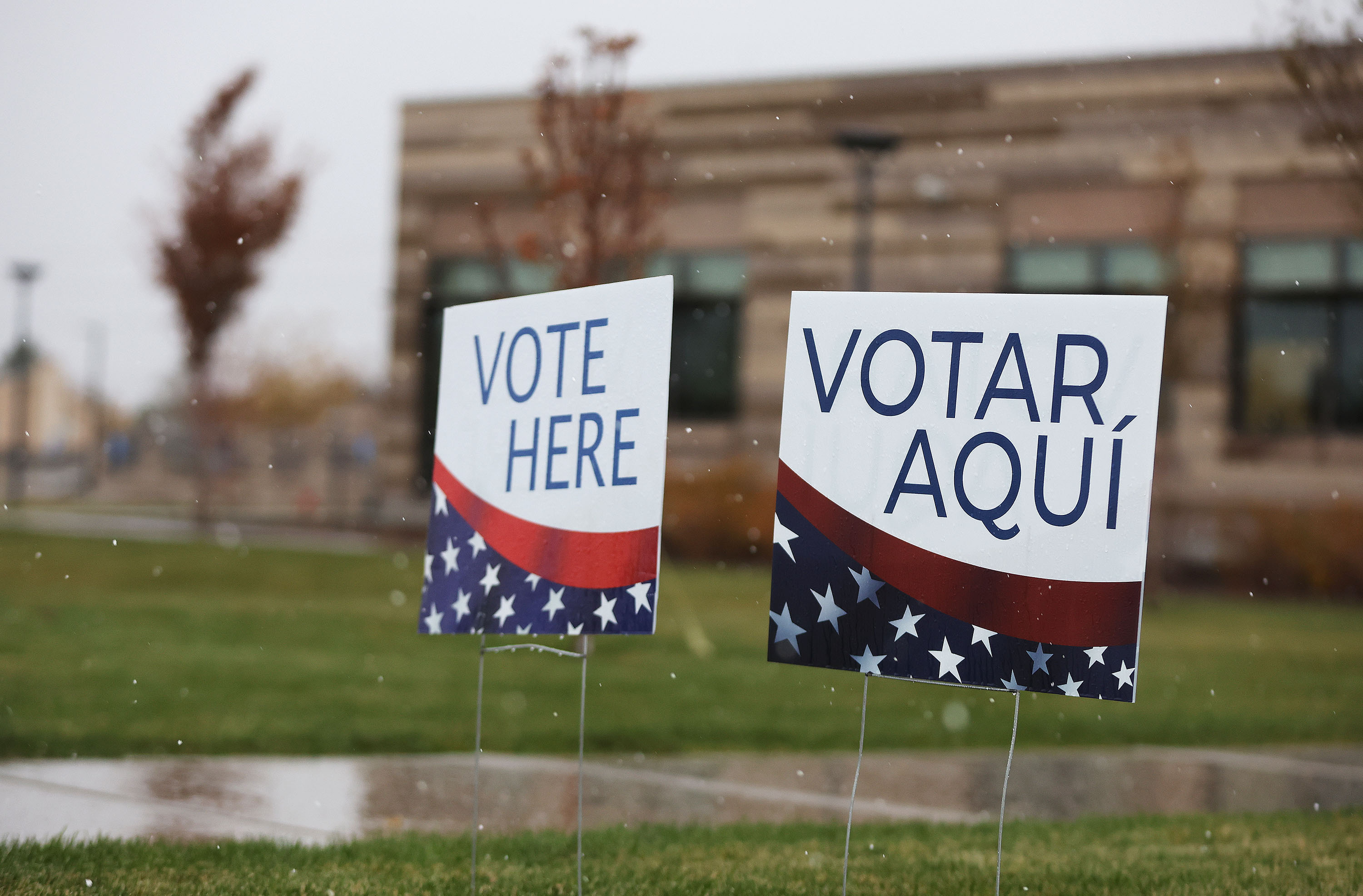Signs show voters polling locations on Election Day in Cottonwood Heights on Tuesday. Several counties updated their election results again Wednesday evening.