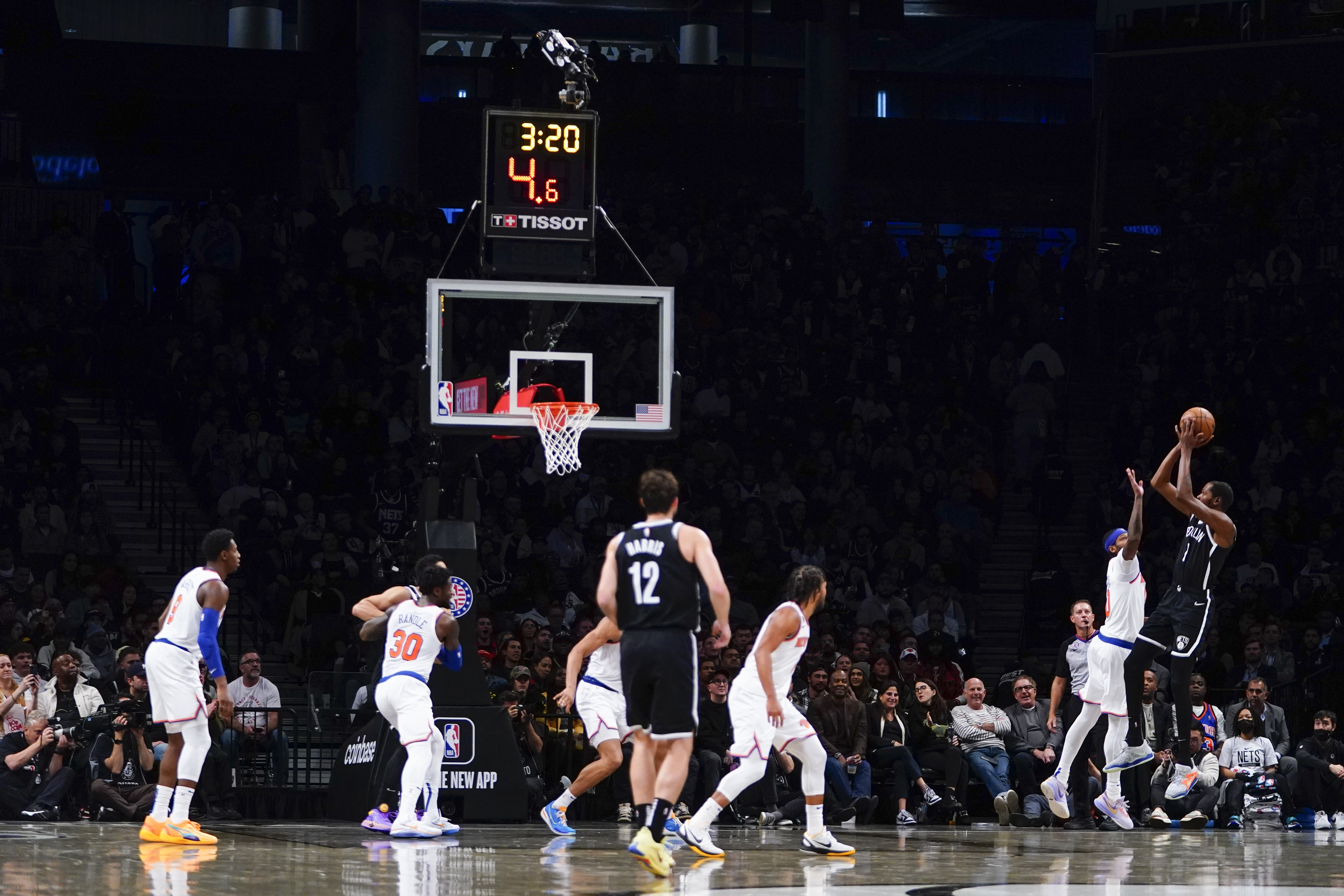 Brooklyn Nets' Kevin Durant, right, shoots over New York Knicks' Cam Reddish during the first half of an NBA basketball game Wednesday, Nov. 9, 2022, in New York. 