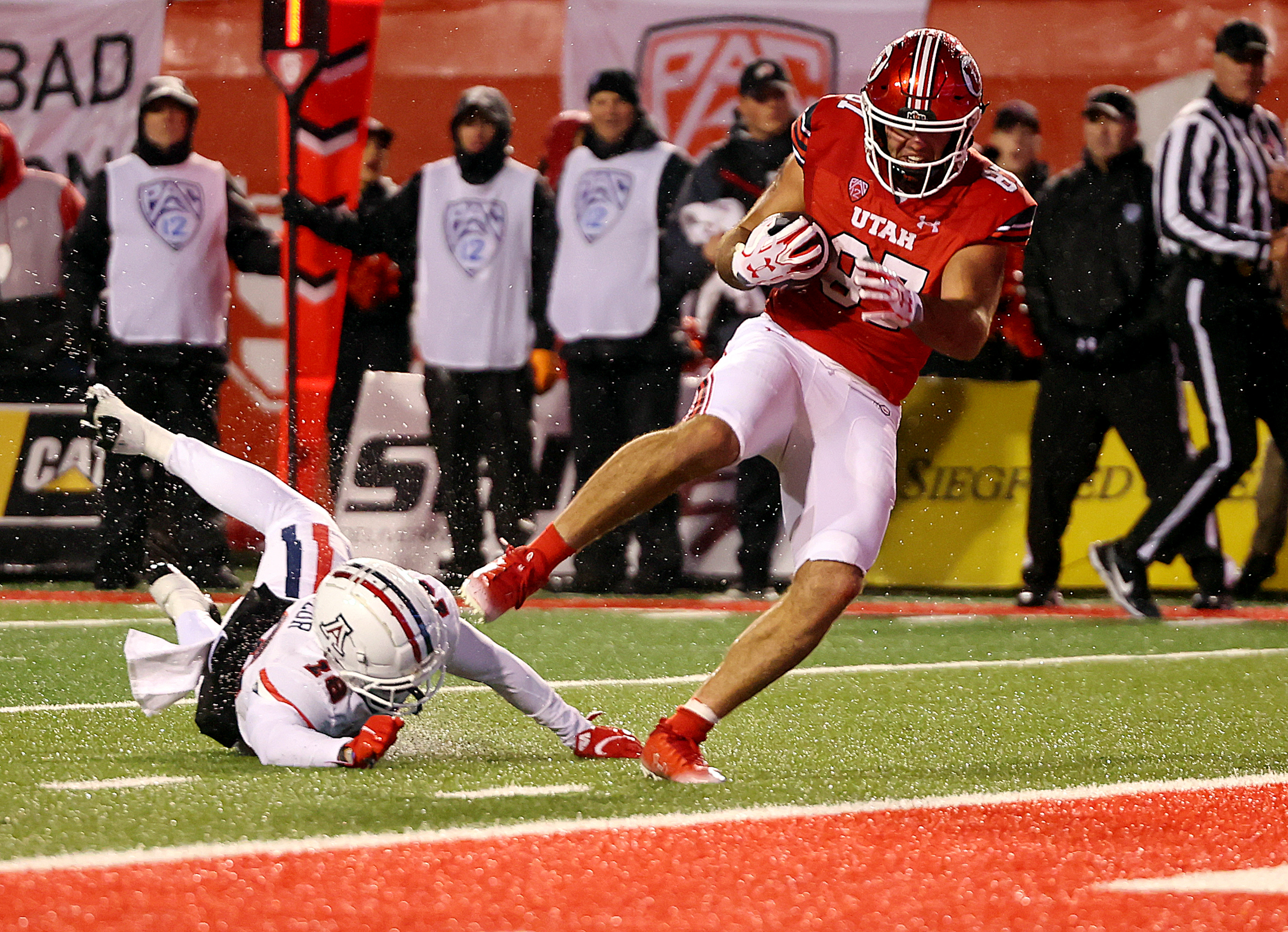 Utah Utes tight end Thomas Yassmin (87) takes the ball into the end zone for a touchdown as Utah and Arizona play at Rice-Eccles Stadium in Salt Lake City on Saturday, Nov. 5, 2022.