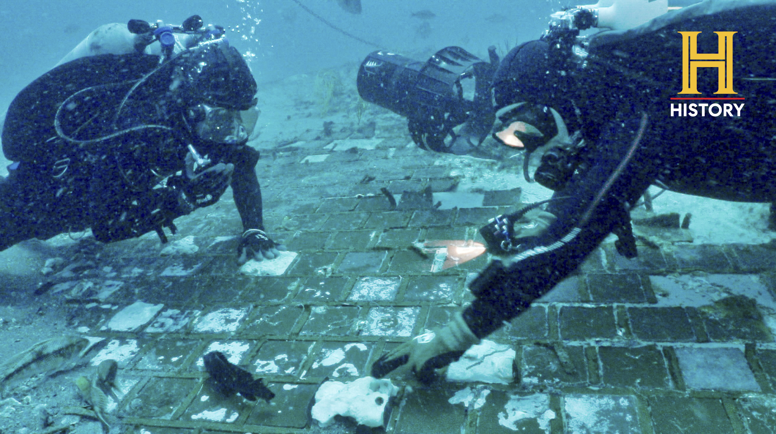 Underwater explorer and marine biologist Mike Barnette and wreck diver Jimmy Gadomski explore a 20-foot segment of the 1986 Space Shuttle Challenger that the team discovered in the waters off the coast of Florida during the filming of The History Channel’s new series, “The Bermuda Triangle: Into Cursed Waters."