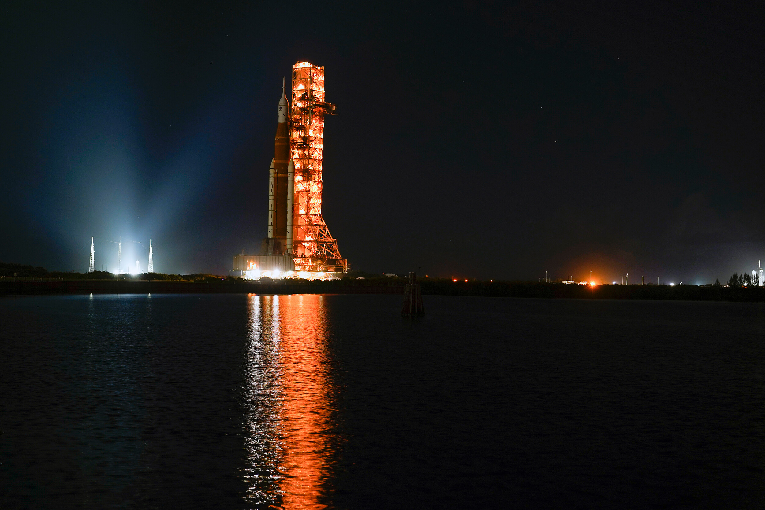The NASA Space Launch System rocket makes its way from the Vehicle Assembly Building to its launchpad at Kennedy Space Center on Nov. 4. The Artemis I moon rocket is still standing after battling Hurricane Nicole.