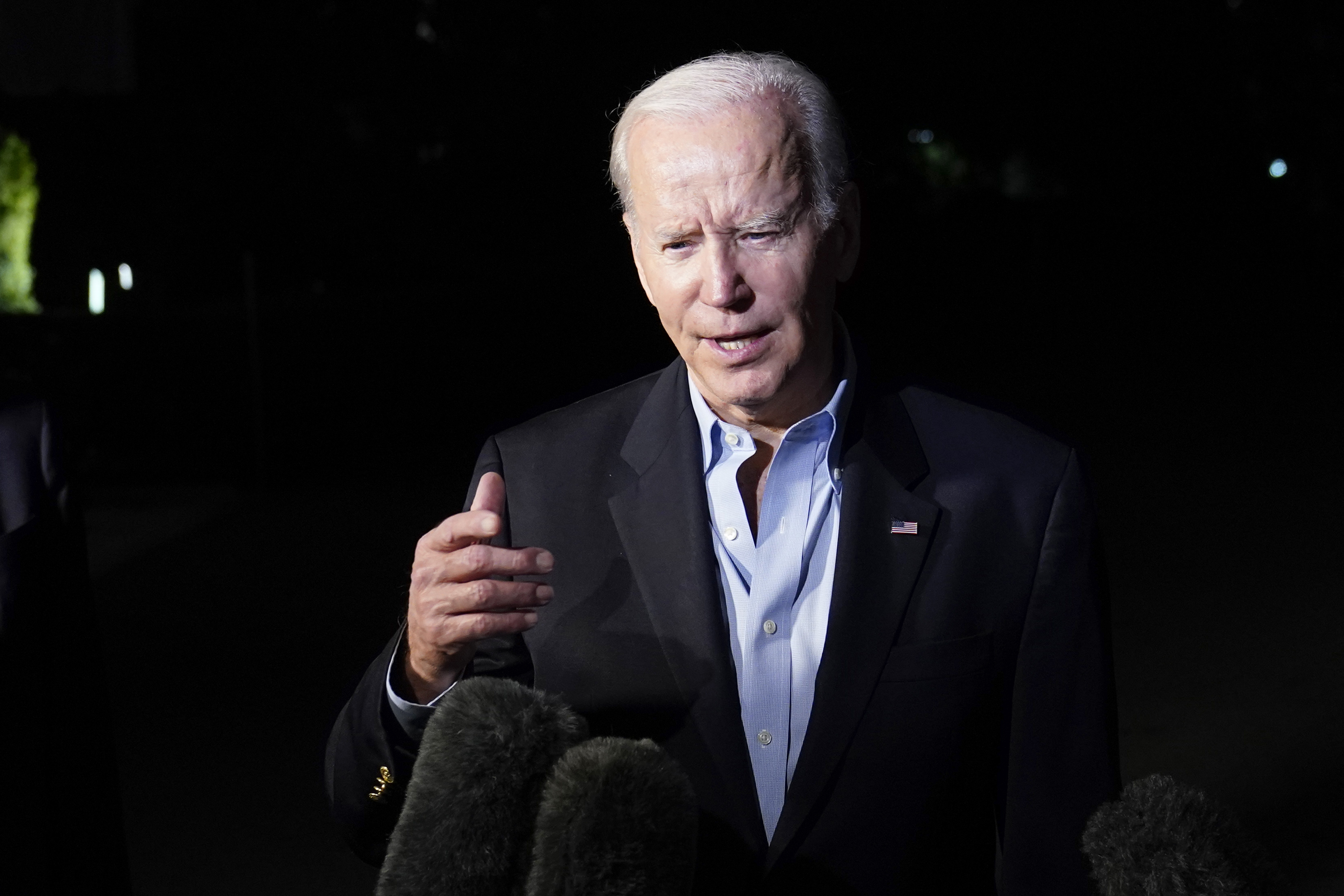 President Joe Biden talks with reporters as he prepares to leave the White House in Washington, Thursday as he begins his foreign trip. Biden's first stop is in Egypt.