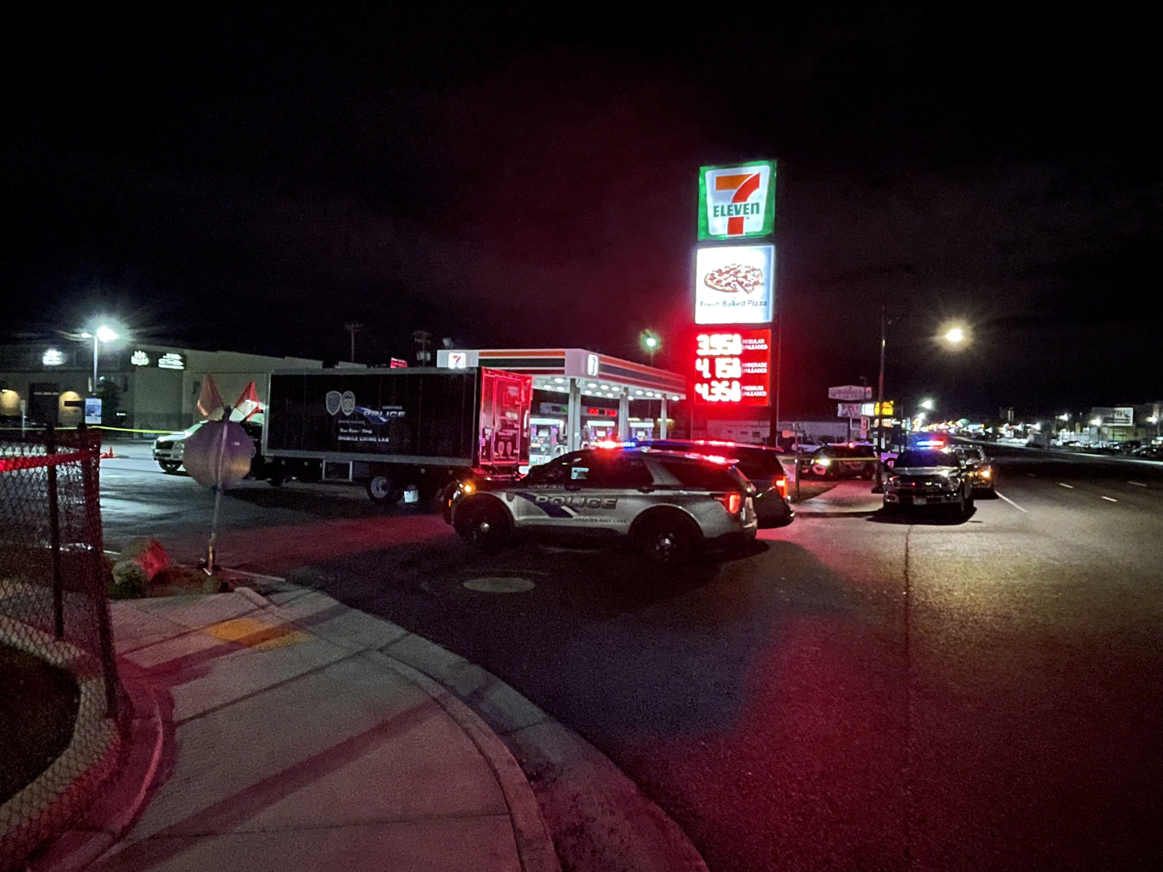 Police respond to a shootout at a Millcreek convenience store, 4051 S. State, on Friday. A second man was arrested Sunday in the incident that ended in the death of an 18-year-old man.