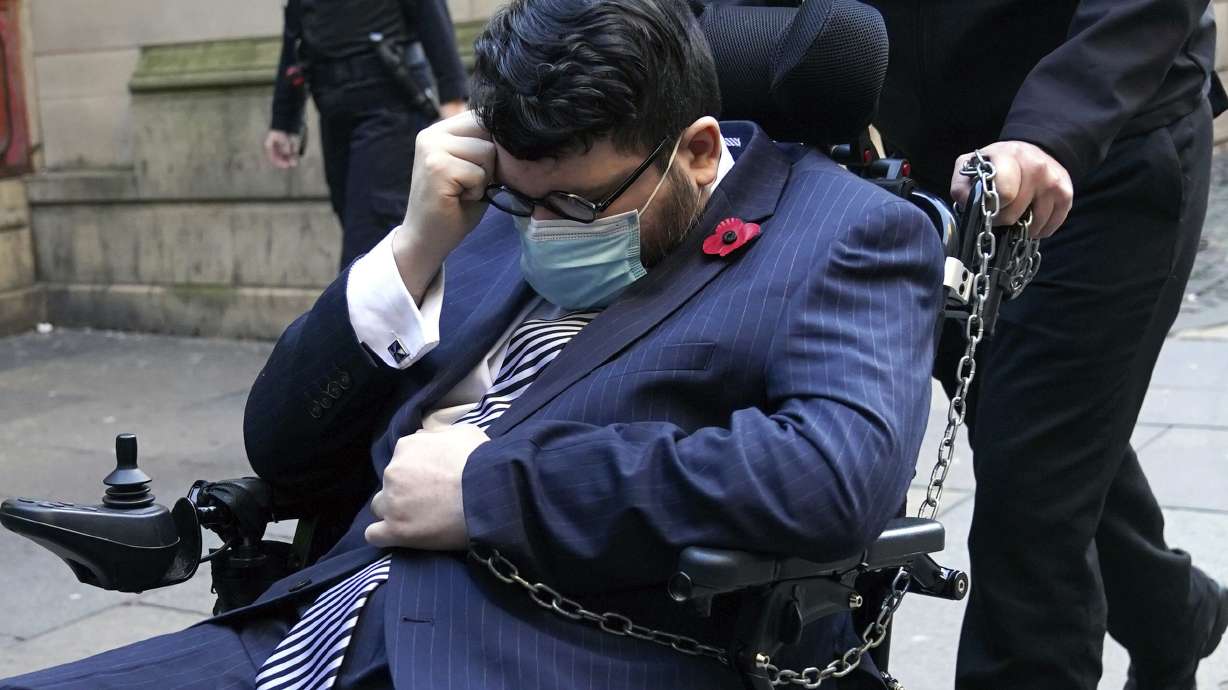 The defendant authorities believe to be Nicholas Rossi arrives at Edinburgh Sheriff And Justice Of The Peace Court for a hearing on his extradition to the U.S., where he is wanted after allegedly fleeing the country in 2017 to evade charges involving identity theft and fraud, and a 2008 sexual assault charge in Utah. The man, who goes by at least 10 other aliases, including Nicholas Alahverdian and Arthur Knight, denies he is Rossi, in Edinburgh, Wednesday.