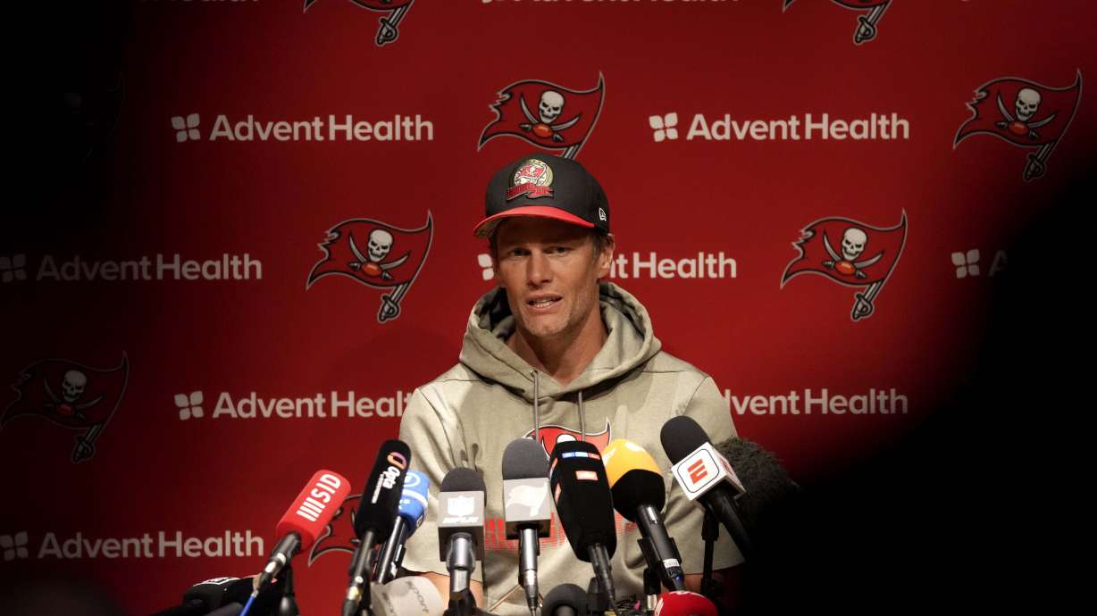 Tampa Bay Buccaneers quarterback Tom Brady attends a news conference after a practice session in Munich, Germany, Friday, Nov. 11, 2022. The Tampa Bay Buccaneers are set to play the Seattle Seahawks in an NFL game at the Allianz Arena in Munich on Sunday.