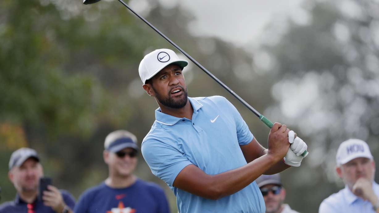 Tony Finau watches his tee shot on the 12th hole during the second round of the Houston Open golf tournament, Friday, Nov. 11, 2022, in Houston.