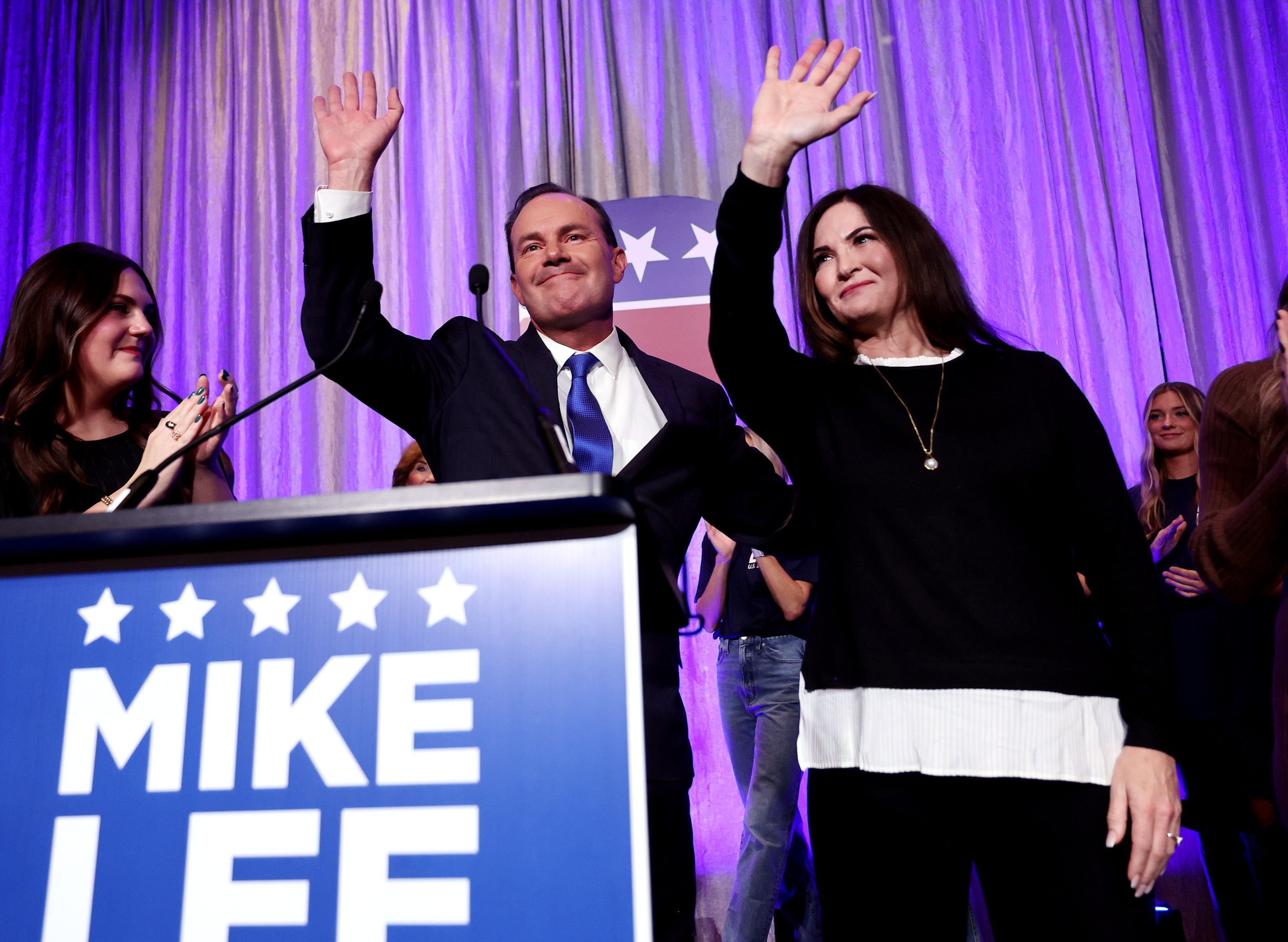 Sen. Mike Lee speaks to a crowd of supporters at an election party at the Hyatt Regency in Salt Lake City on Tuesday. Lee was joined onstage with his wife Sharon Lee, and other family and friends.