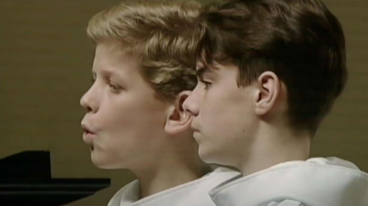 This classic video stars two young boys from the French boy's choir, Les Petits Chanteurs a la Croix de Bois, also known as the Little Singers of Paris.