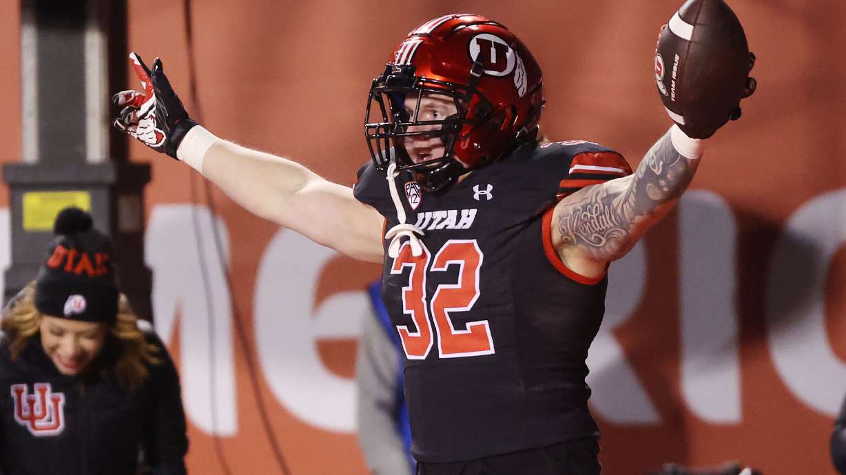 Utah Utes tight end Logan Kendall (32) celebrates his touchdown against the Stanford Cardinal in Salt Lake City on Saturday, Nov. 12, 2022.