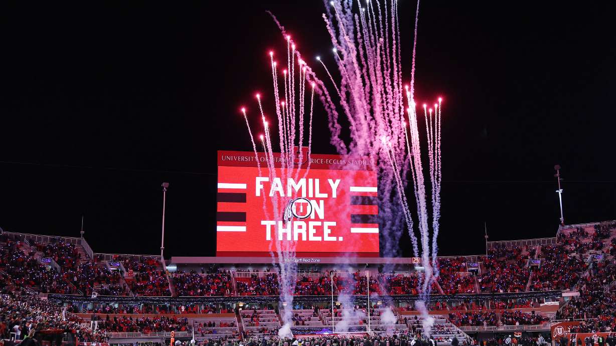 The Utah Utes honor Ty Jordan and Aaron Lowe during a timeout in Salt Lake City on Saturday, Nov. 12, 2022.