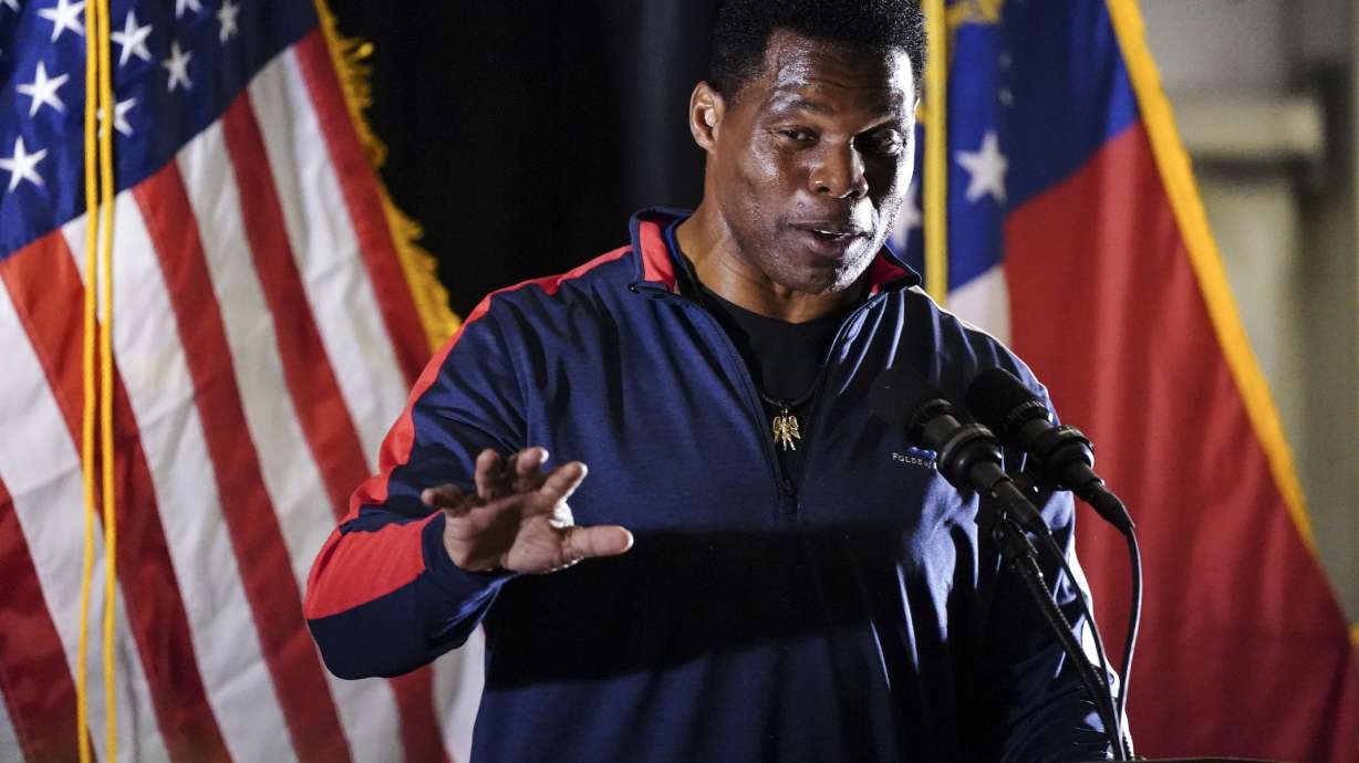 Republican nominee for U.S Senate Herschel Walker speaks during a campaign rally Thursday, in Canton, Ga.. Walker is in a runoff with incumbent Democrat Raphael Warnock.
