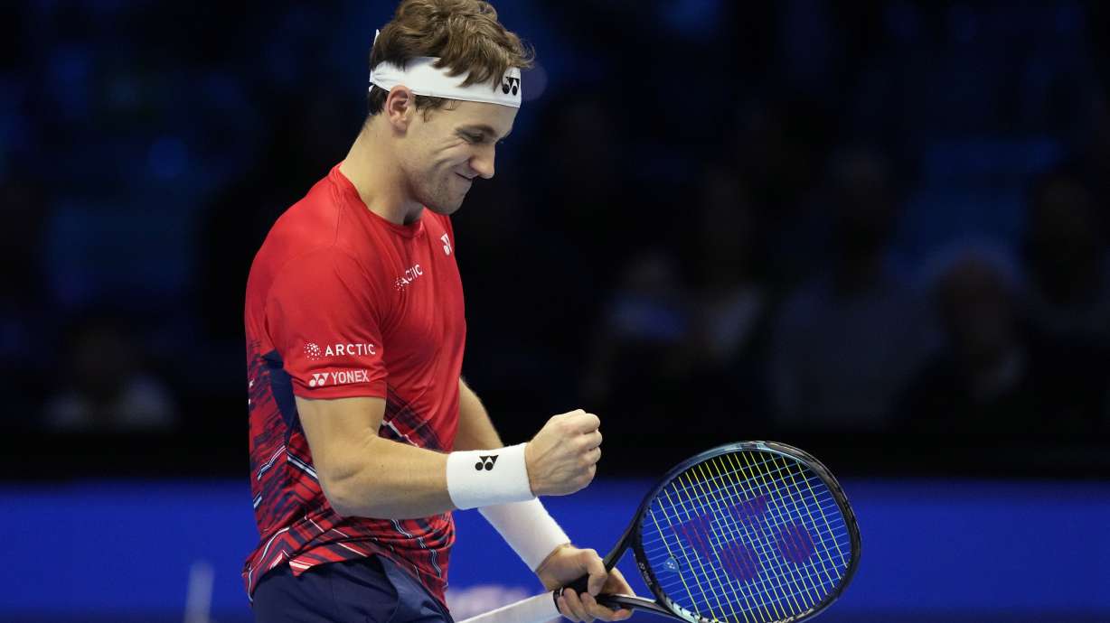 Norway's Casper Ruud reacts after winning a point against Canada's Felix Auger-Aliassime during their singles tennis match of the ATP World Tour Finals, at the Pala Alpitour in Turin, Italy, Sunday, Nov. 13, 2022.