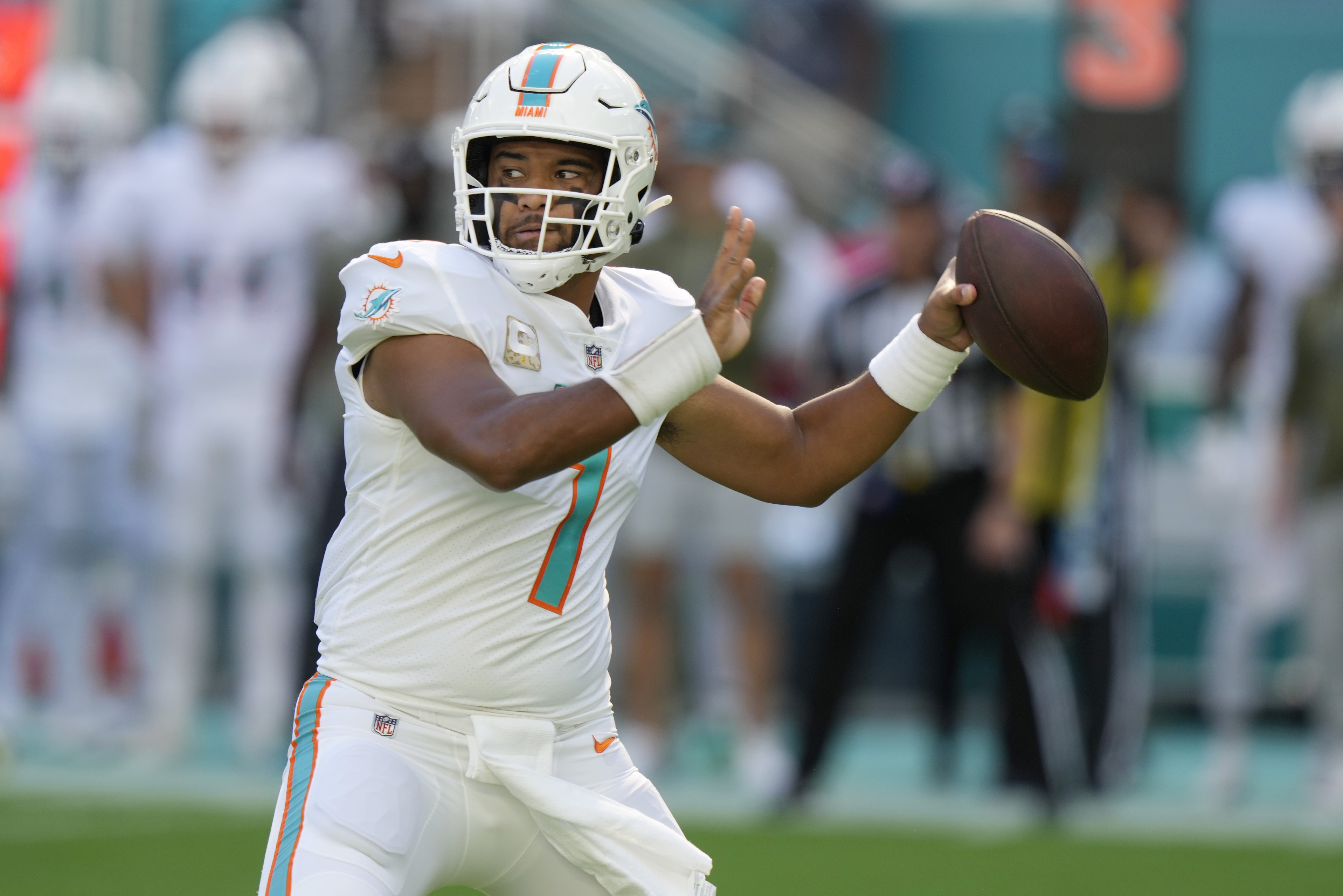 Miami Dolphins quarterback Tua Tagovailoa (1) aims the ball during the first half of an NFL football game against the Cleveland Browns, Sunday, Nov. 13, 2022, in Miami Gardens, Fla. 