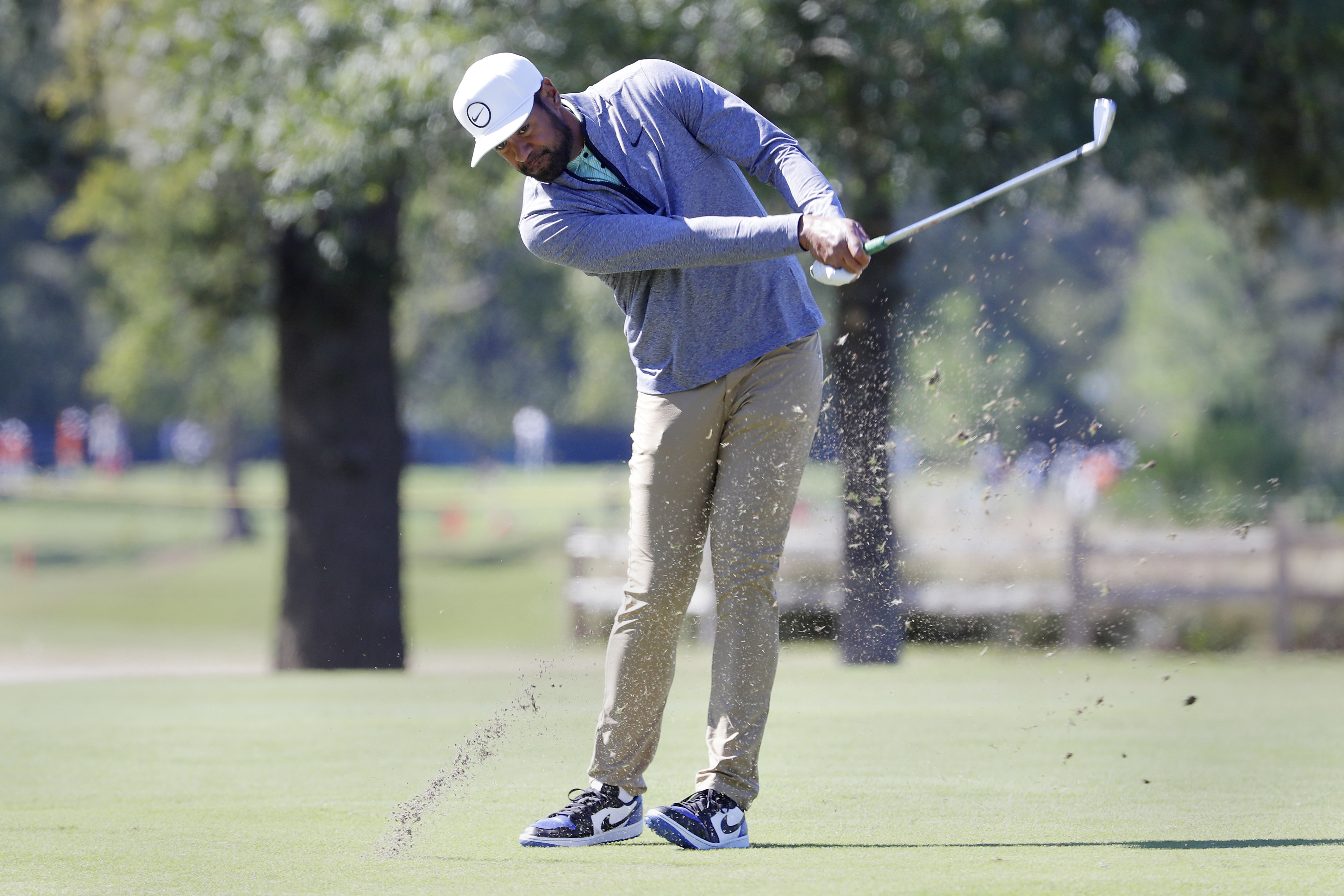 Tony Finau hits on the eighth fairway during the final round of the Houston Open golf tournament Sunday, Nov. 13, 2022, in Houston.