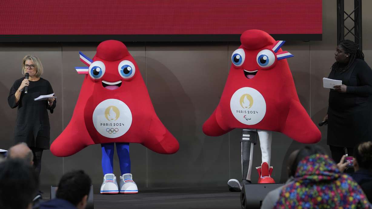 The mascots of the 2024 Paris Olympic Games, left, and Paralympic Games are presented Monday, Nov. 14, 2022 in Saint-Denis, outside Paris. The mascot, a Phrygian cap, also known as a liberty cap, is an updated version of a conical hat worn in antiquity in places such as Persia, the Balkans, Thrace, Dacia and Phrygia, where the name originates, in modern day Turkey. It later became a symbol of the pursuit of liberty in the French Revolution, and is still worn by the figure of Marianne, the national personification of France since that time.