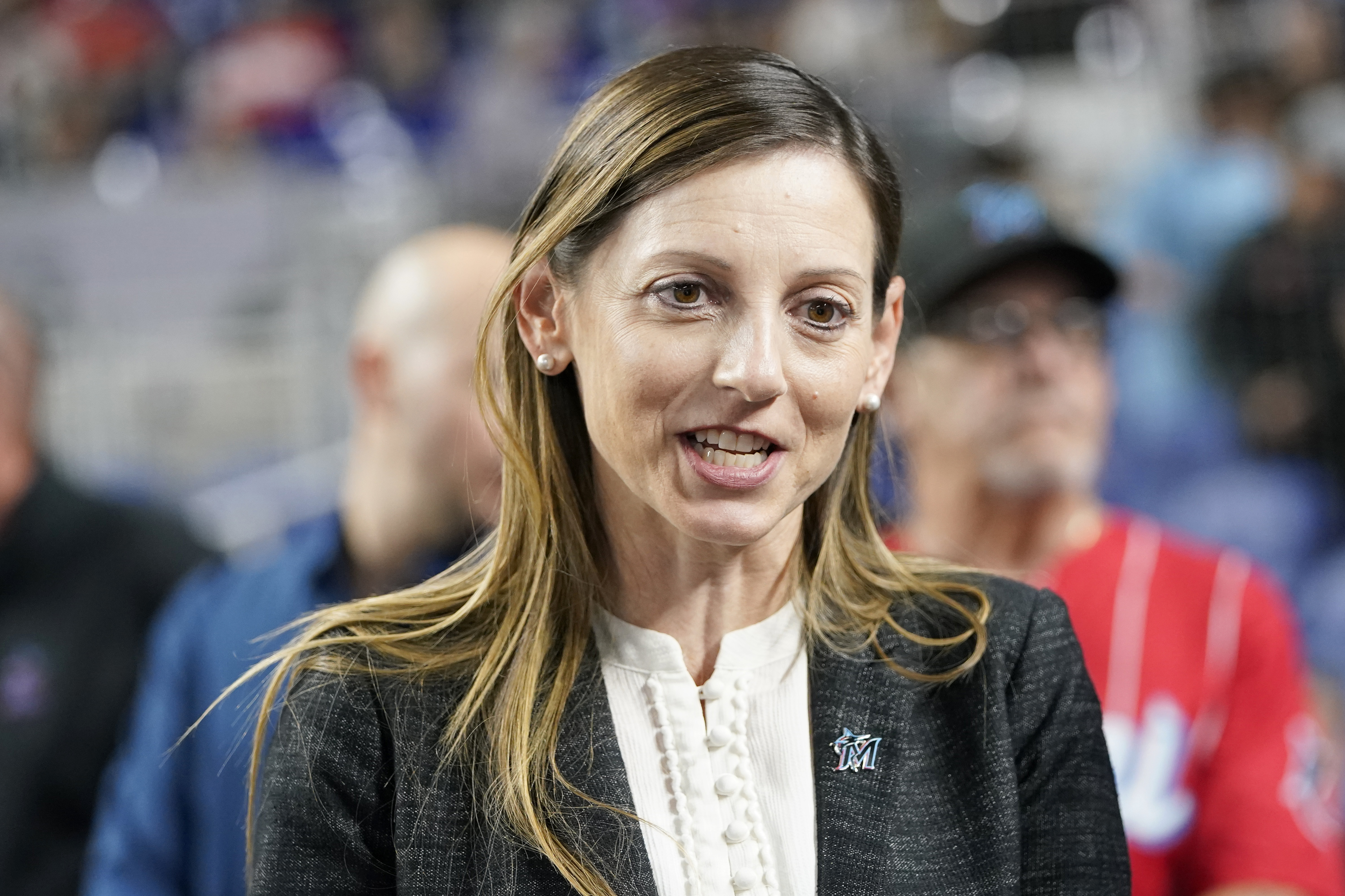 Caroline O'Connor appears before a baseball game against the Philadelphia Phillies, April 15, 2022, in Miami. The Miami Marlins promoted O’Connor to president of business operations on Monday, Nov. 14, 2022 making them the first U.S. major sports franchise to have women as both president and general manager. The Marlins made history by hiring Kim Ng as GM in November 2020; two years later, they’ve now made another significant move. 