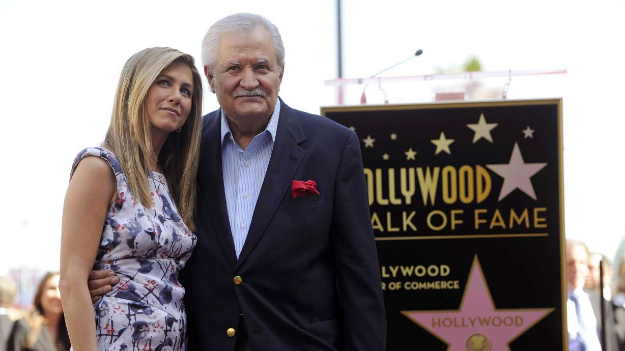 Jennifer Aniston with her father John Aniston in 2012. John Aniston died Friday, his daughter shared on Monday.