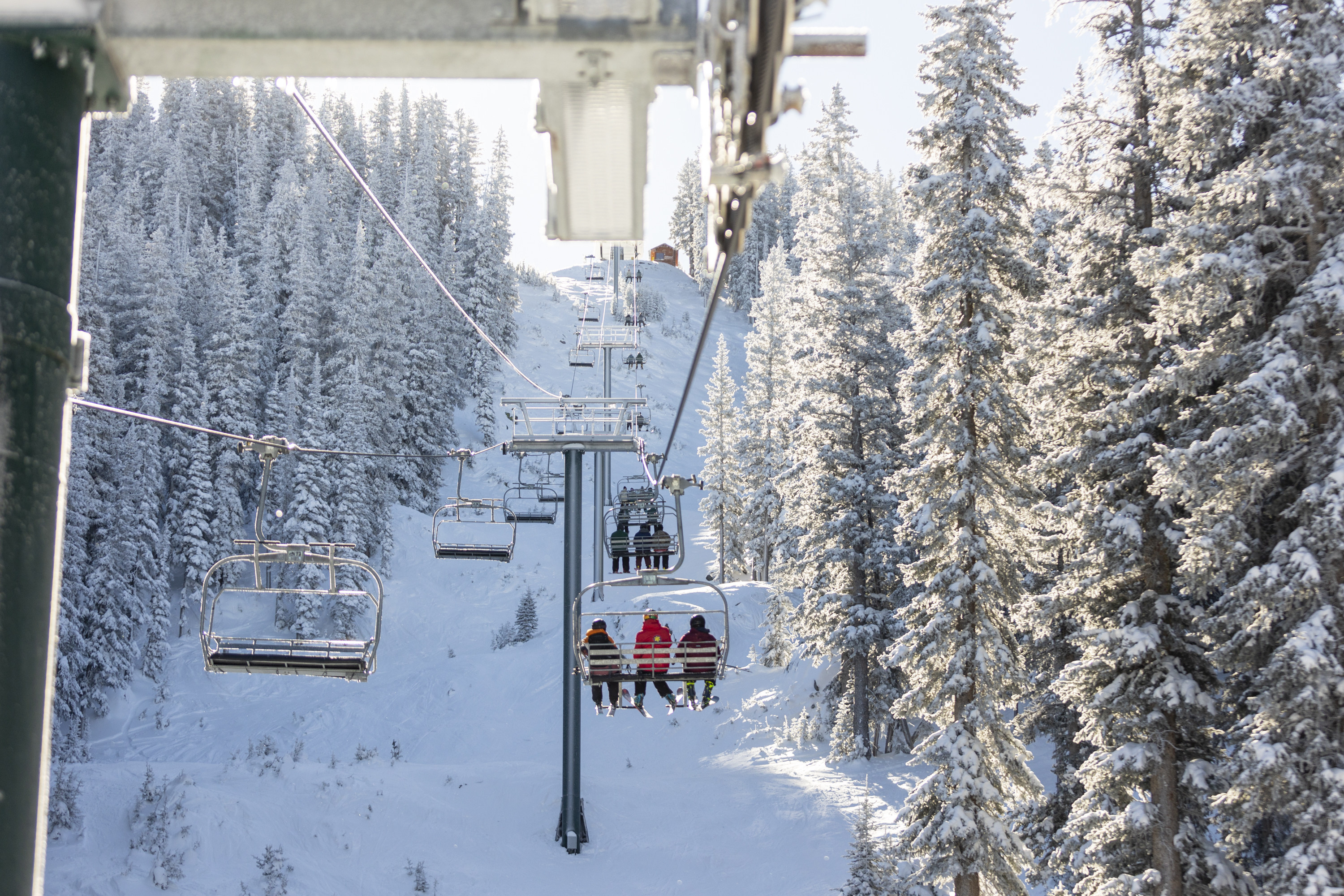 People ride the lift at Brighton Resort in Big Cottonwood Canyon on Monday.