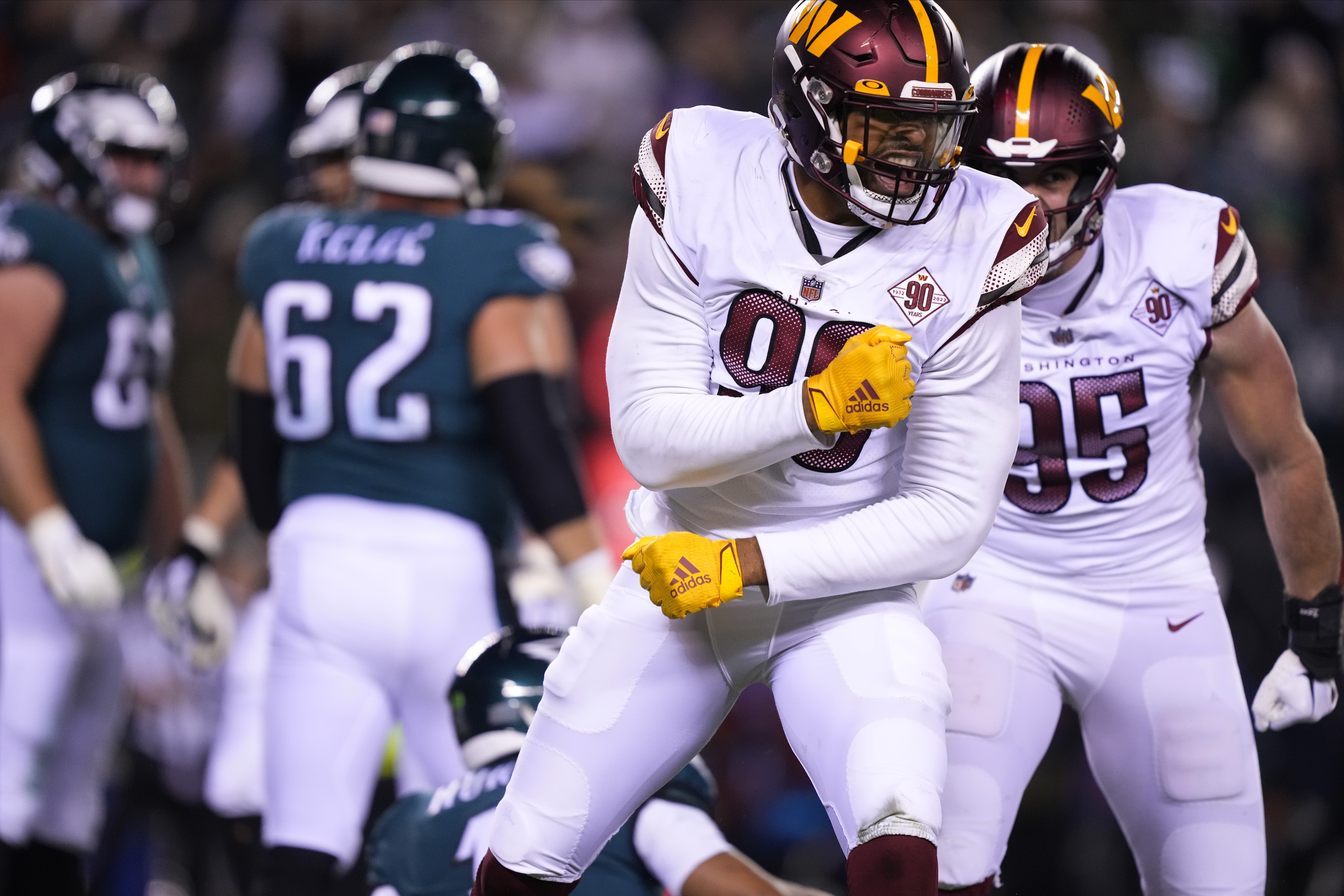 Washington Commanders defensive end Montez Sweat reacts after sacking Philadelphia Eagles quarterback Jalen Hurts during the second half of an NFL football game, Monday, Nov. 14, 2022, in Philadelphia. 