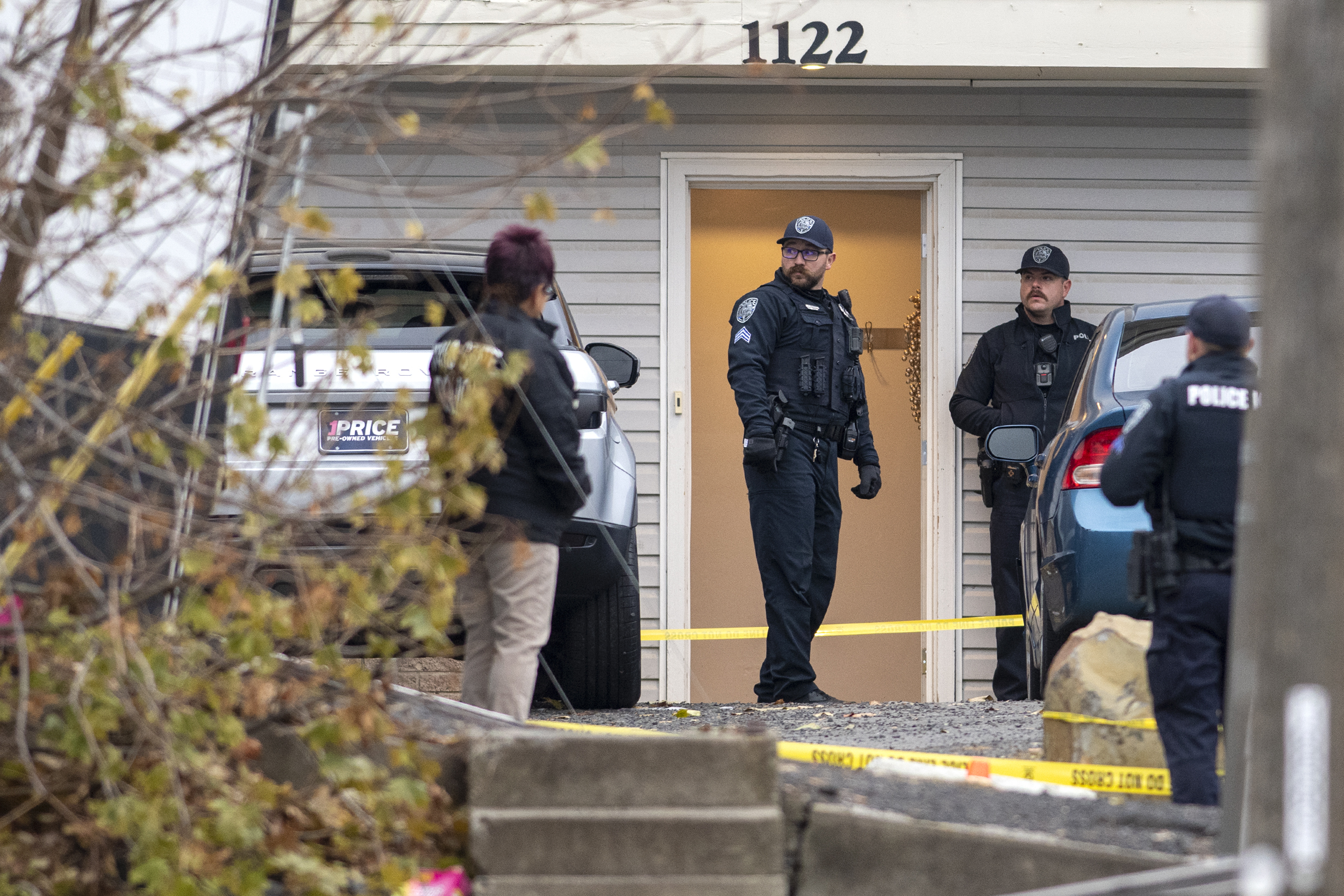 Officers investigate a homicide at an apartment complex south of the University of Idaho campus on Sunday. Four people were found dead on King Road near the campus, according to a city of Moscow news release issued Sunday afternoon.