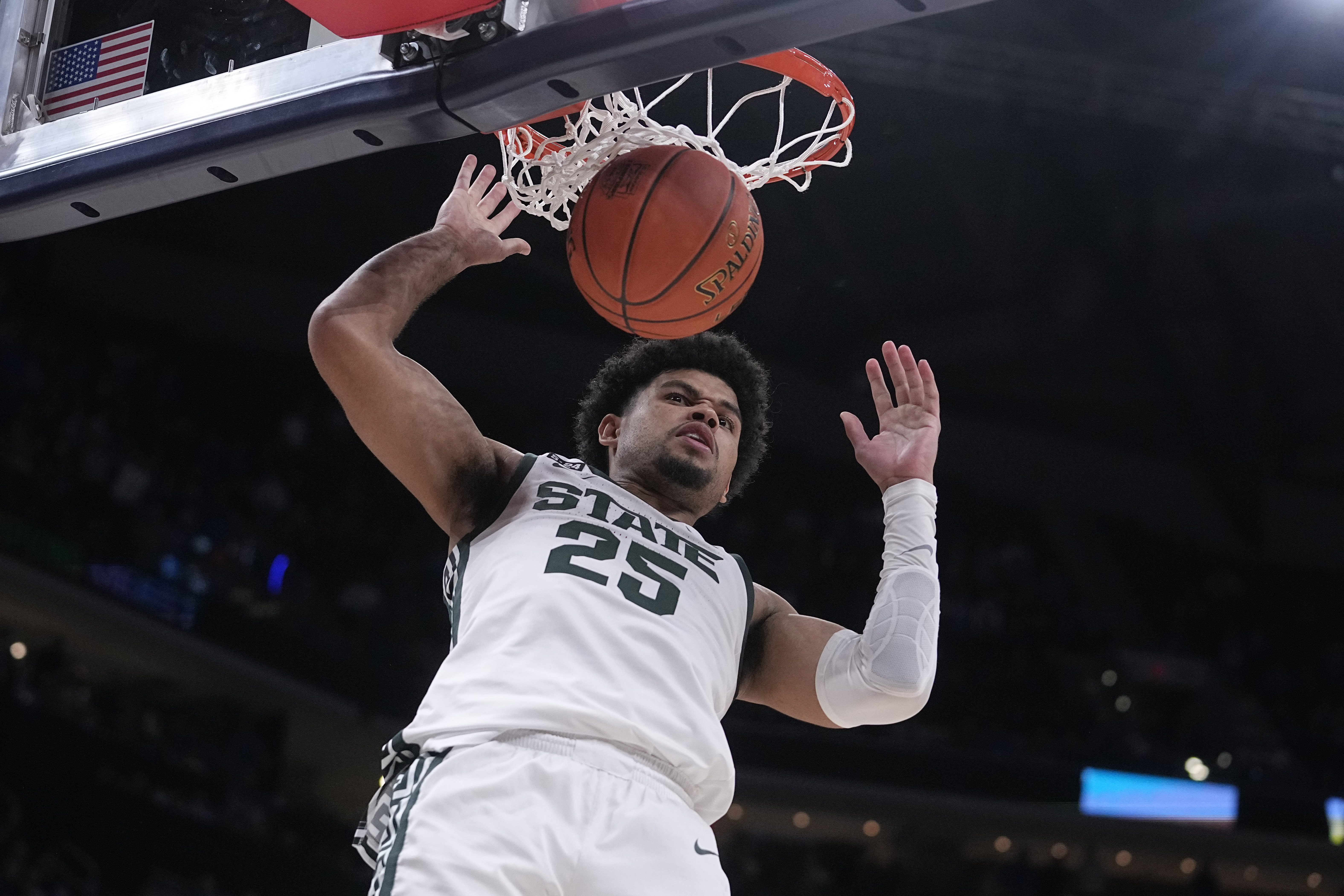 Michigan State forward Malik Hall (25) scores against Kentucky during the second half of an NCAA college basketball game, Tuesday, Nov. 15, 2022, in Indianapolis. 
