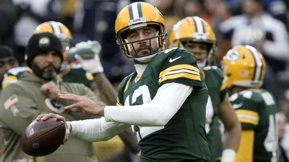 Green Bay Packers quarterback Aaron Rodgers warms up before an NFL football game against the Dallas Cowboys Sunday, Nov. 13, 2022, in Green Bay, Wis.
