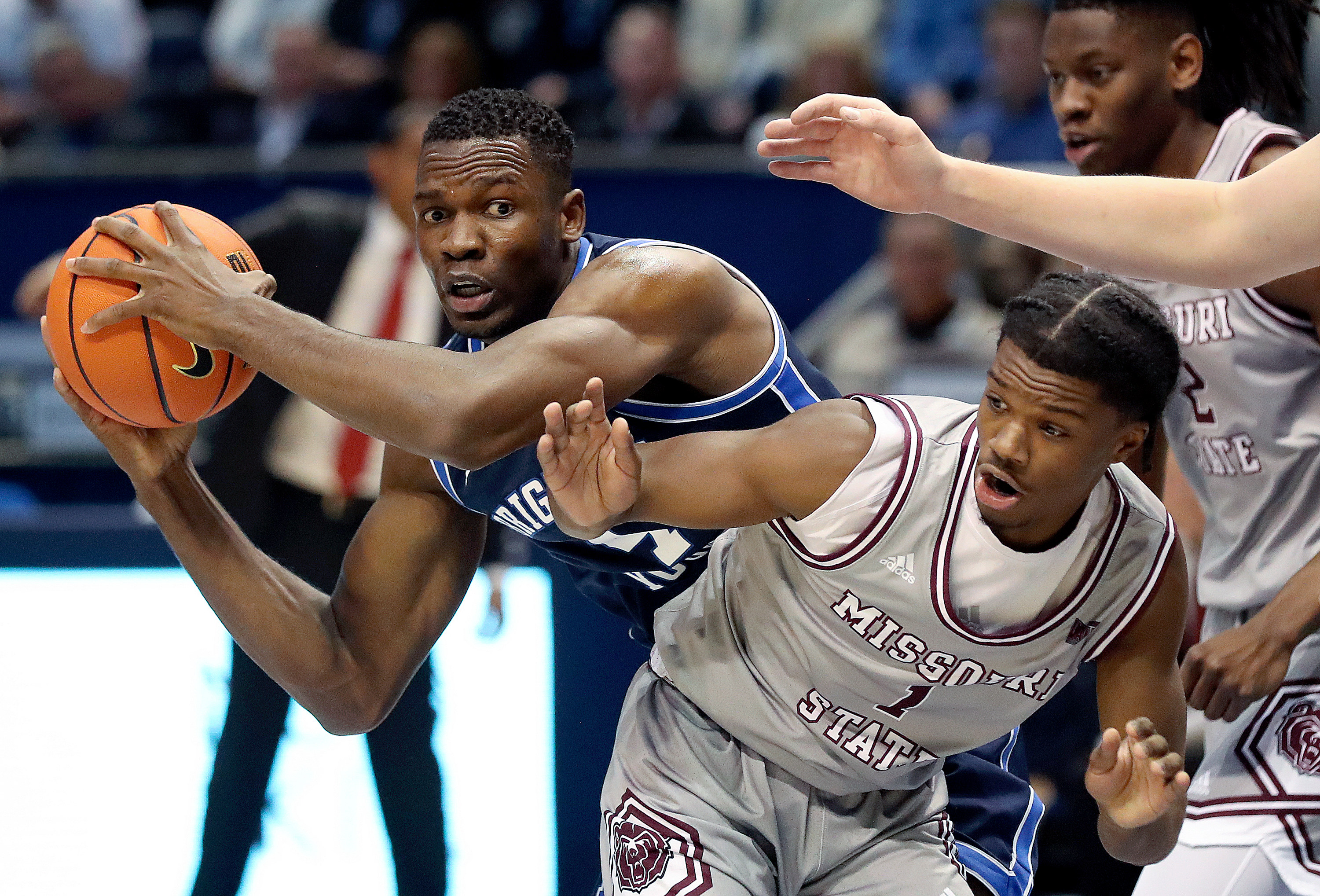 Brigham Young forward Atiki Ally Atiki (4) shoots around Missouri State guard Alston Mason (1) during a men’s basketball game at the Marriott Center in Provo on Wednesday, Nov. 16, 2022.