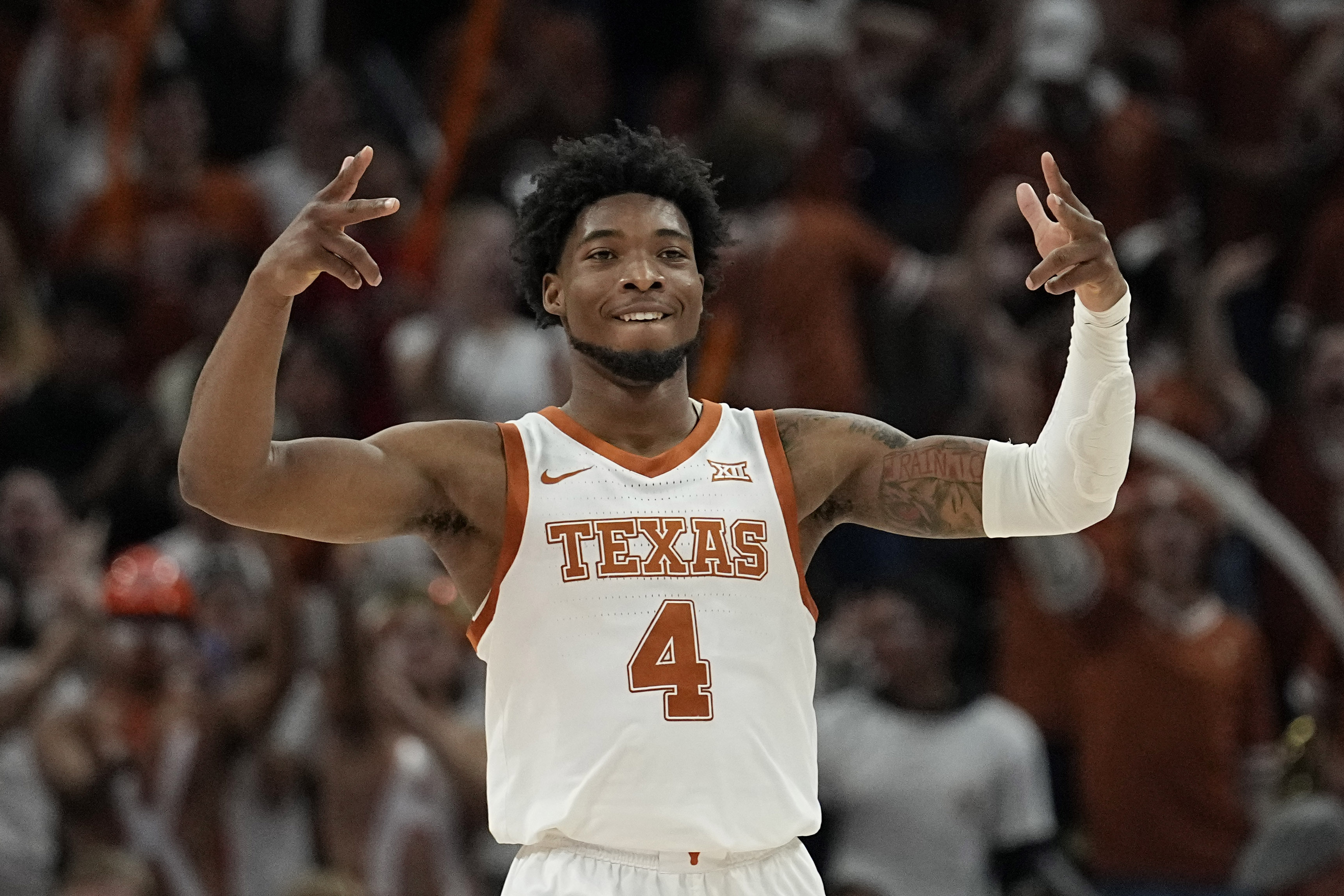 Texas guard Tyrese Hunter (4) celebrate a score during the second half of an NCAA college basketball game against Gonzaga, Wednesday, Nov. 16, 2022, in Austin, Texas.