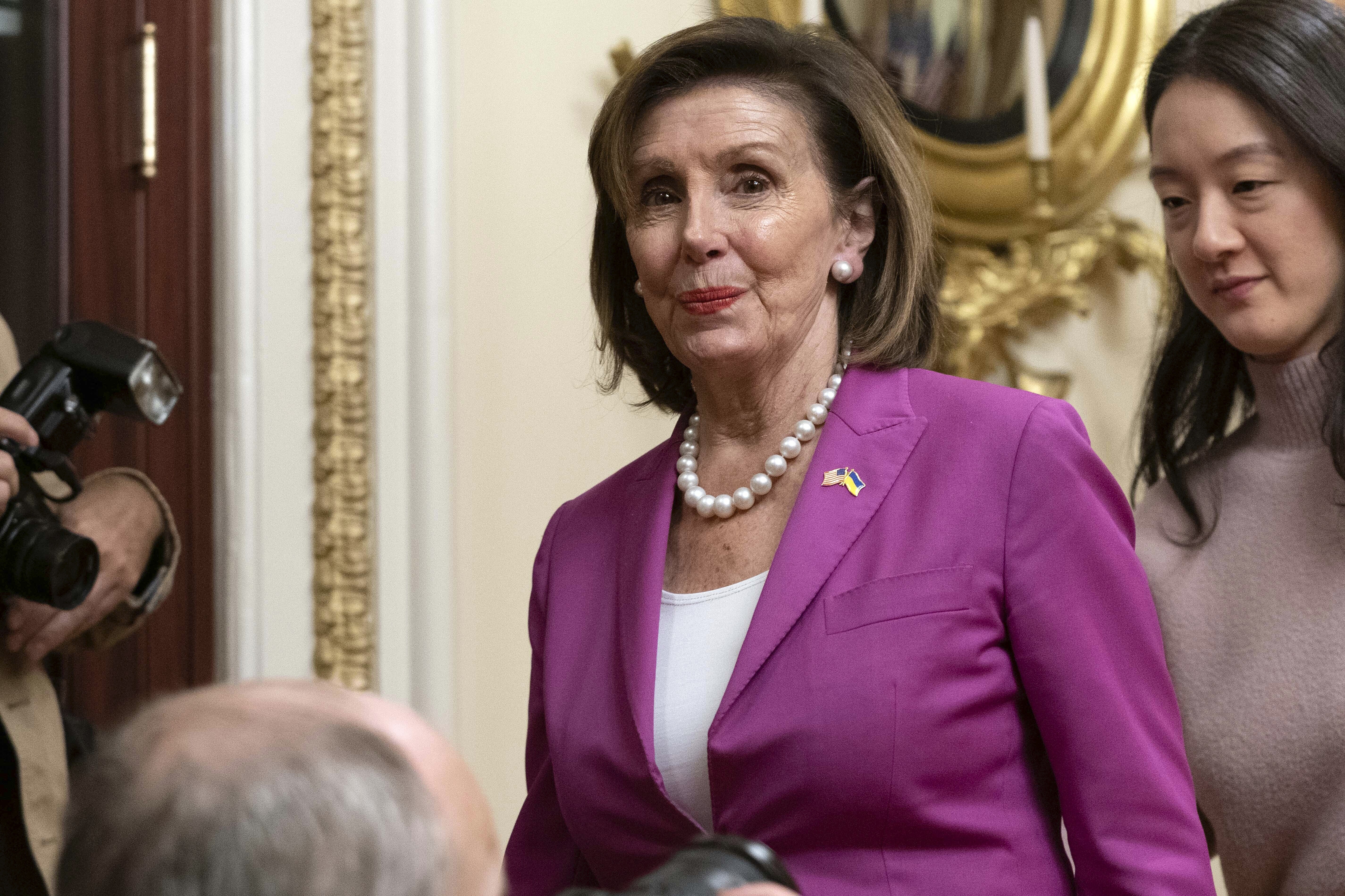 Speaker of the House Nancy Pelosi of Calif., leaves the room after a ceremonial swearing-in on Capitol Hill in Washington, Monday. Thursday, Pelosi said she will not seek a leadership role in the new Congress.