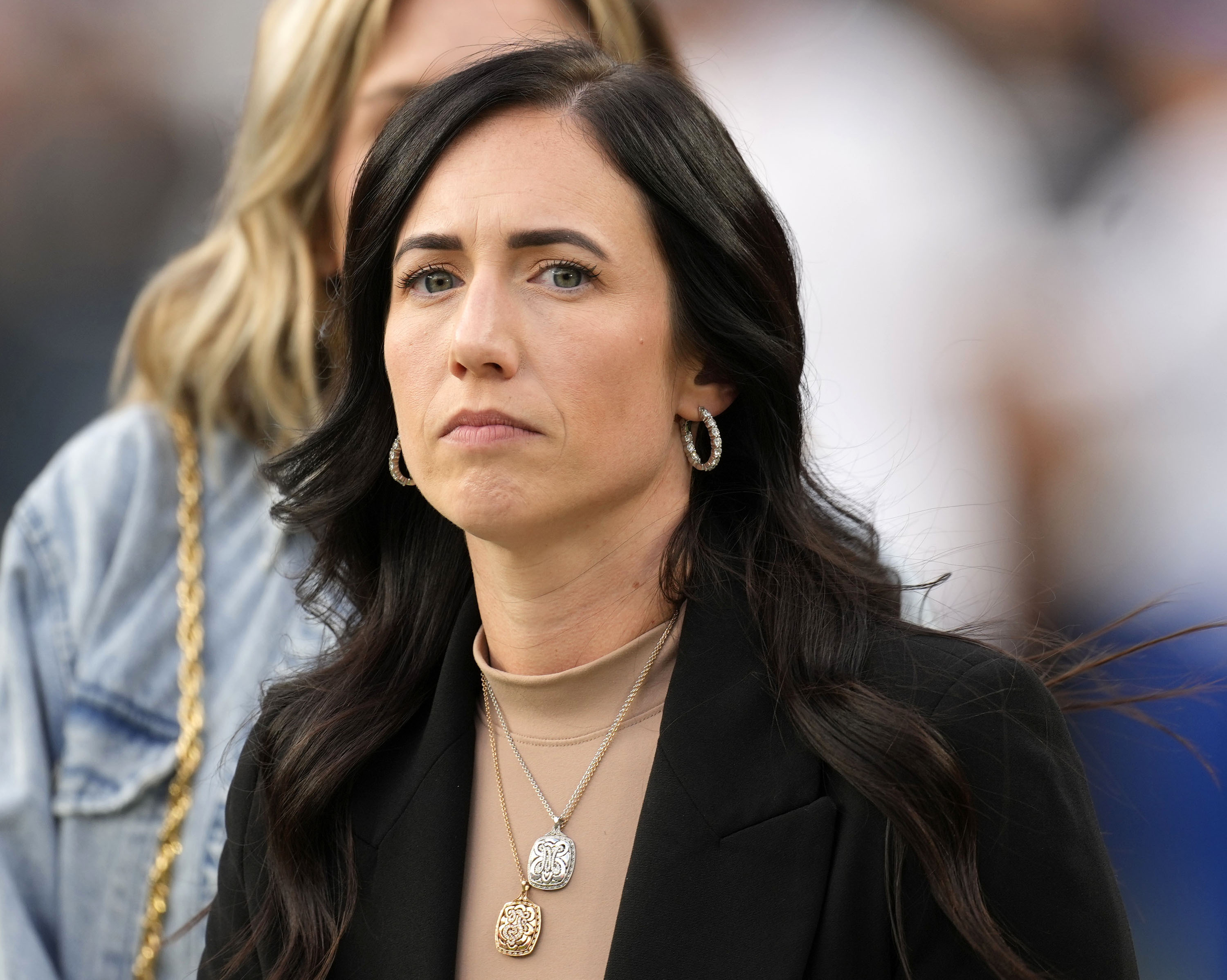FILE - Indianapolis Colts vice chair Kalen Jackson, also one of the team's owners, watches during the first half of the Colts' NFL football game against the Denver Broncos, Oct. 6, 2022, in Denver. From the owner’s suite to the front office to the sidelines, the number of women in the NFL is steadily rising.  Jackson was born into football, one of three daughters of Indianapolis Colts owner Jim Irsay. She got her introduction to the sport attending community events. Now, she has a seat at the table for owners’ meetings. 