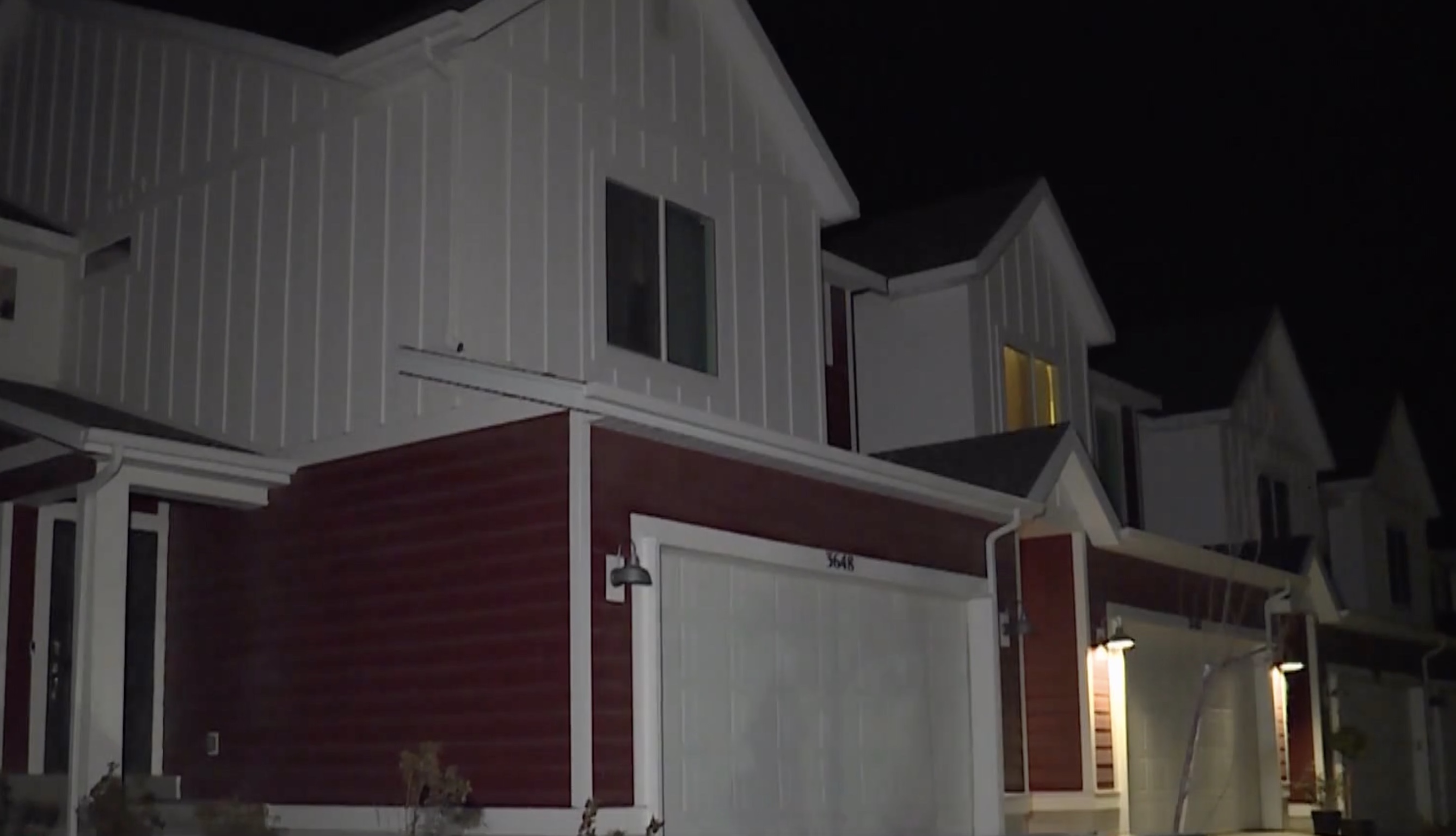 A gunshot fired through the wall of a townhome Wednesday led officers to arrest the neighbor, following the discovery of greater destruction inside that man’s home next door.